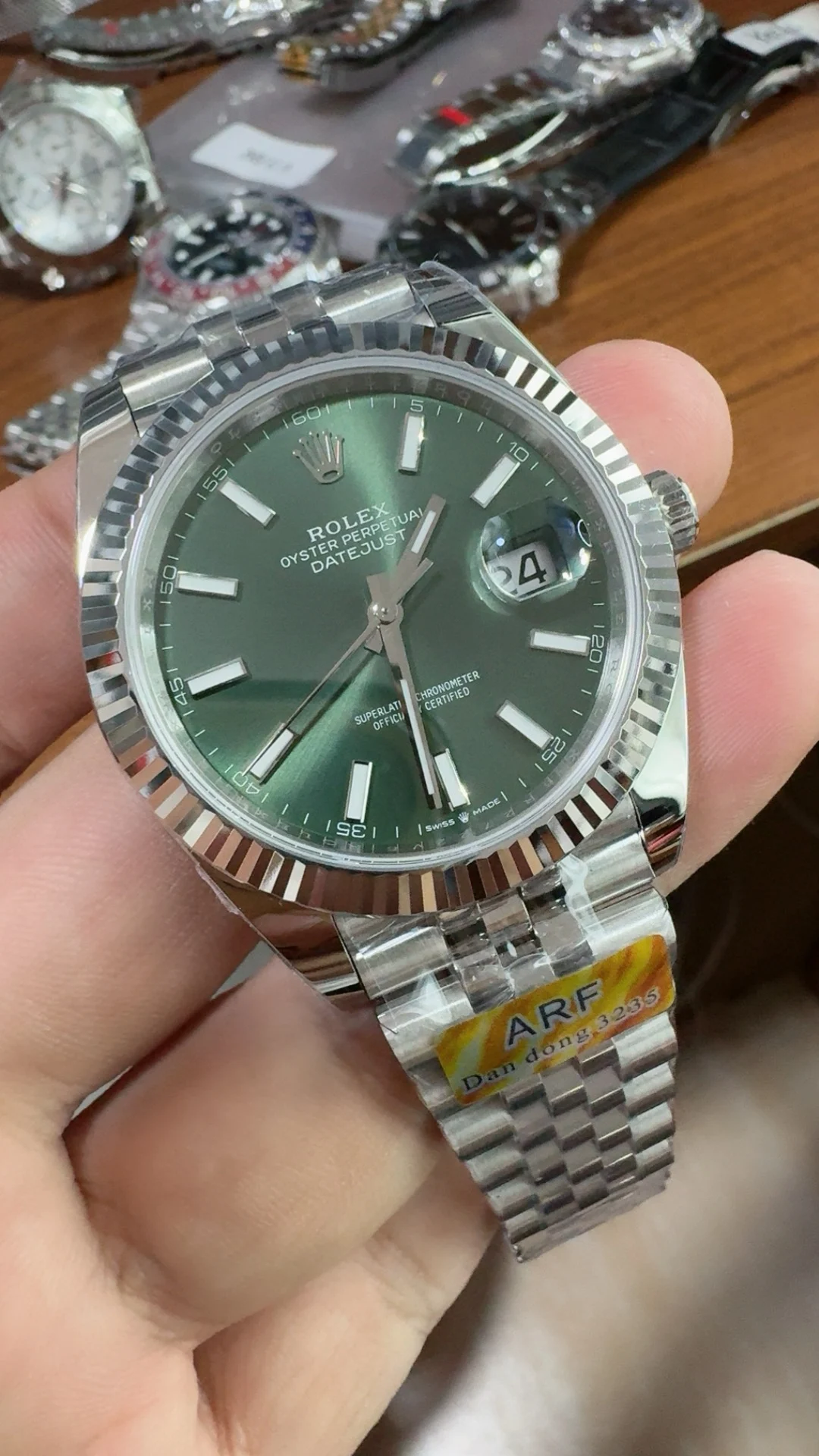 Rolex Datejust Green Dial 41mm — photographed off the sweep