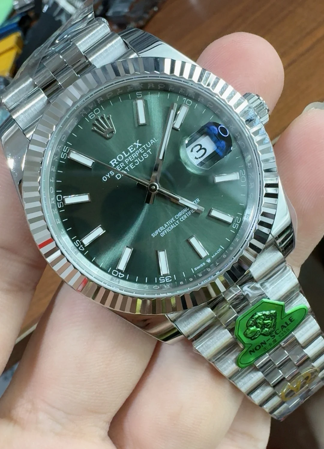 Rolex Datejust Green Dial 41mm — photographed off the sweep