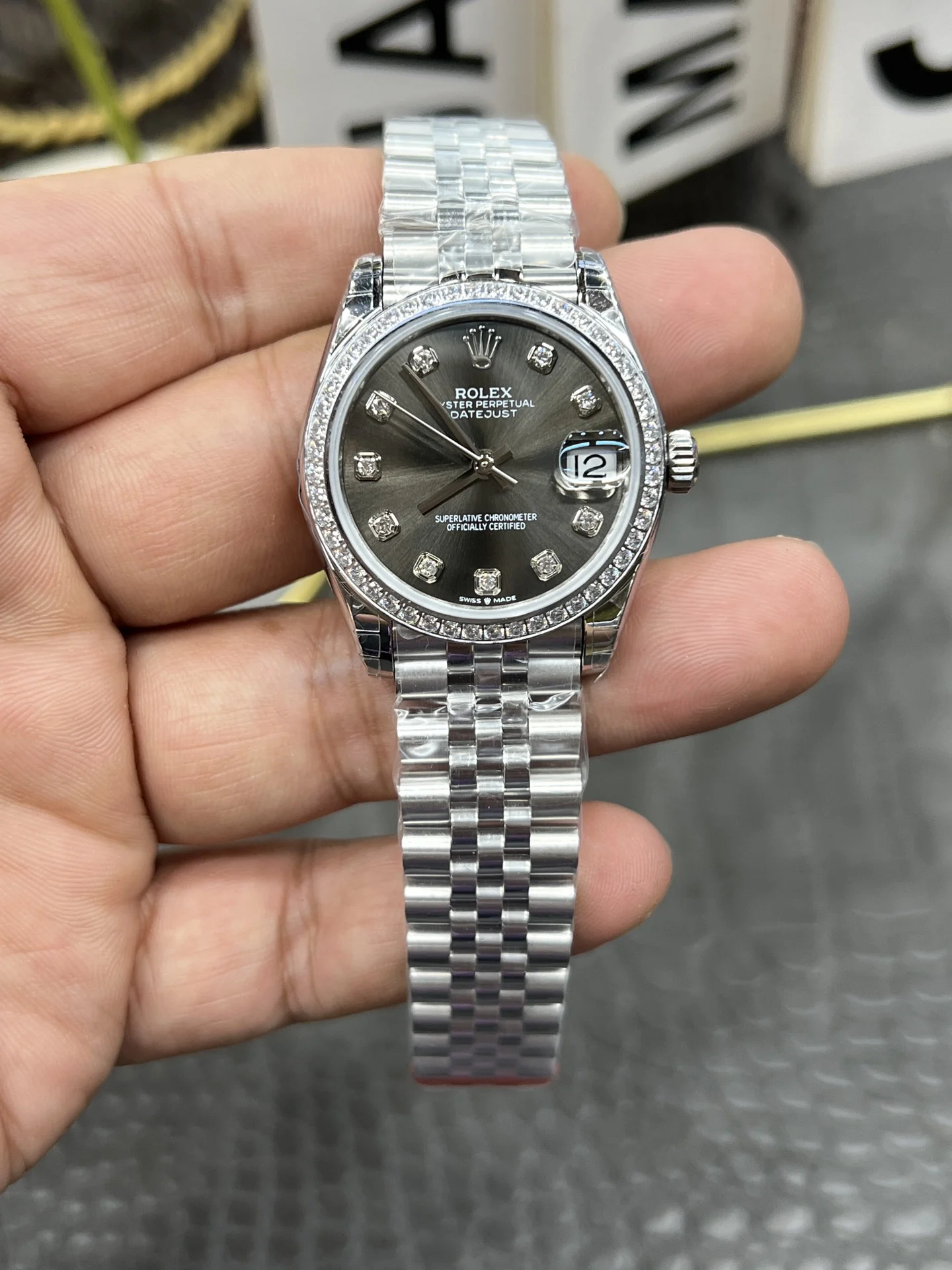 Rolex Datejust Grey Dial Diamond-Set 31mm — photographed off the sweep