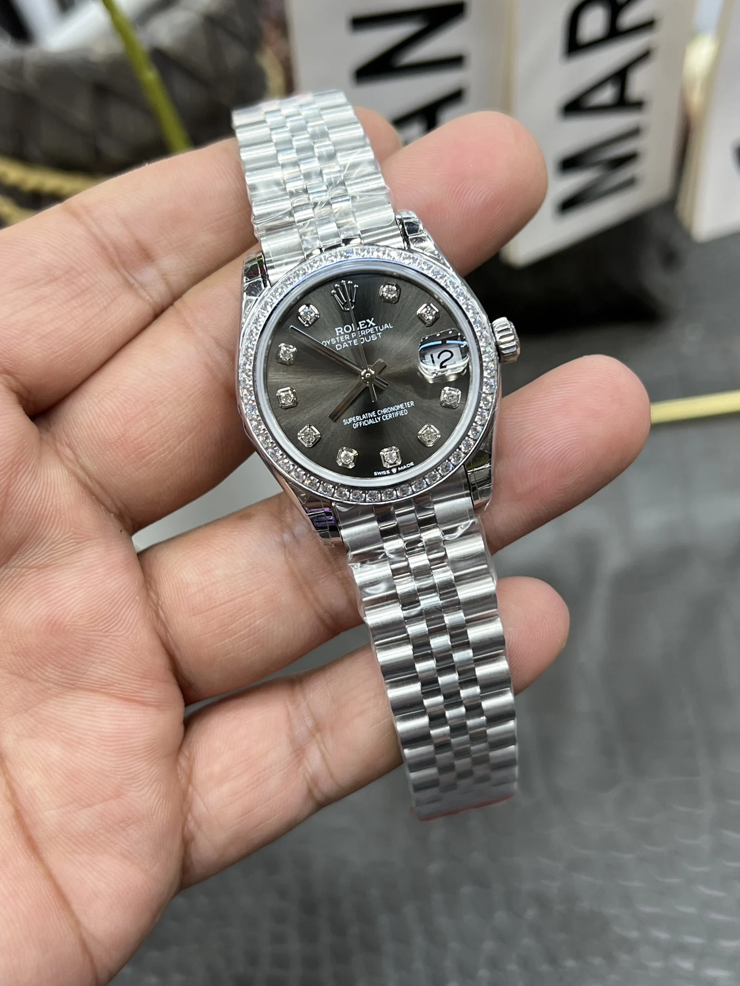 Rolex Datejust Grey Dial Diamond-Set 31mm — photographed off the sweep