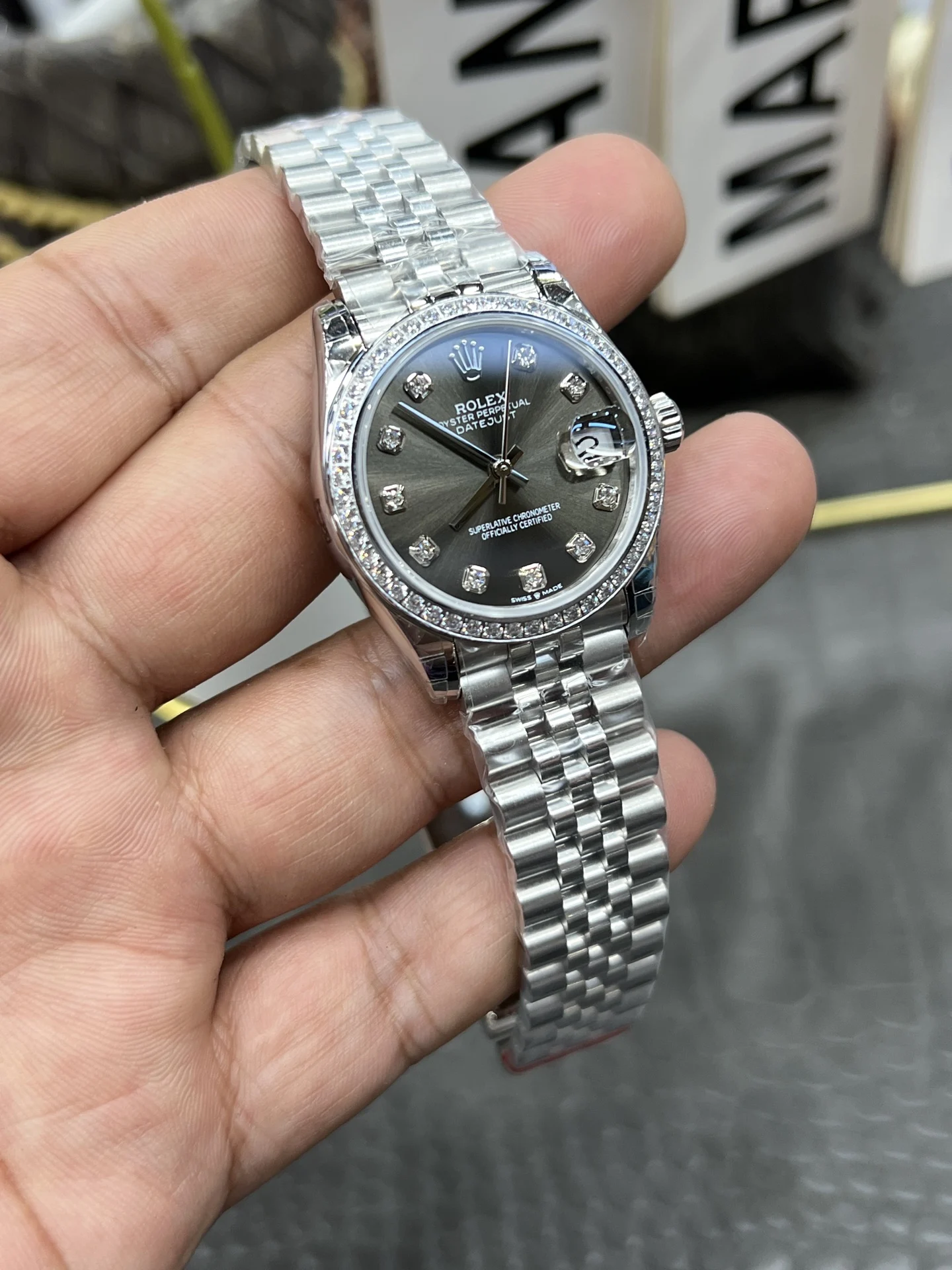 Rolex Datejust Grey Dial Diamond-Set 31mm — photographed off the sweep