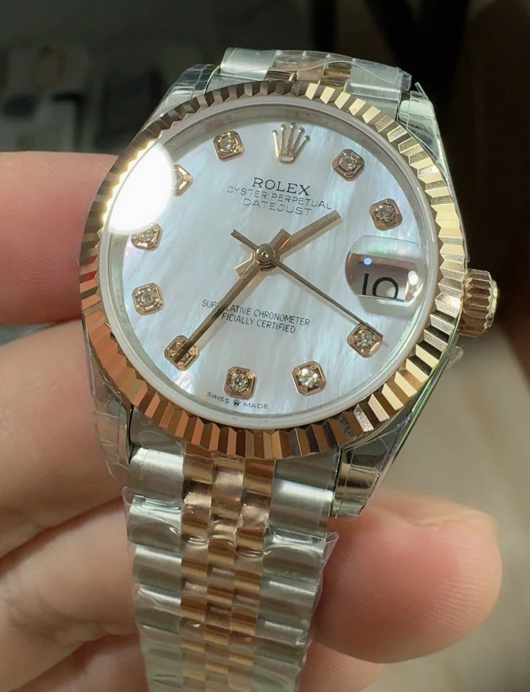 Rolex Datejust Mother of Pearl Rose Gold — photographed off the sweep