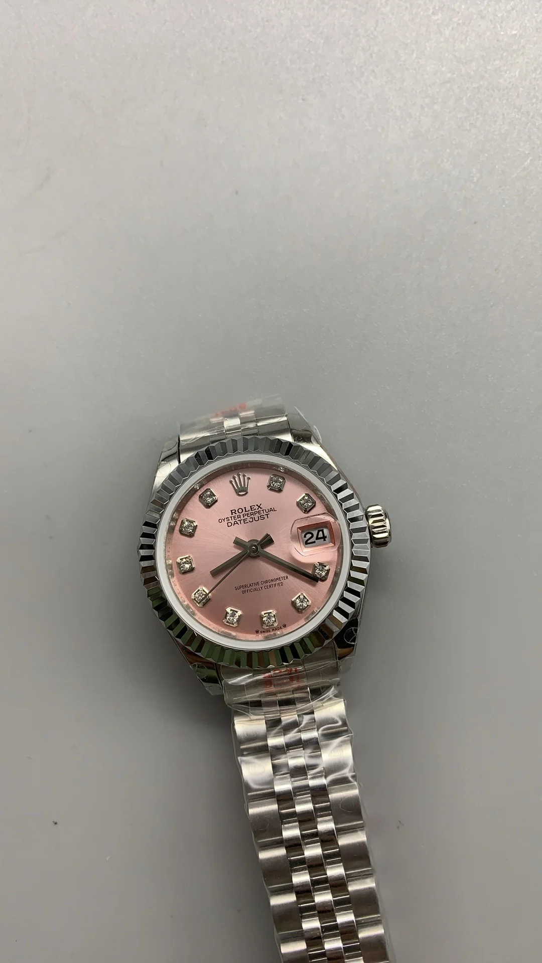 Rolex Datejust Pink Dial 28mm — photographed off the sweep