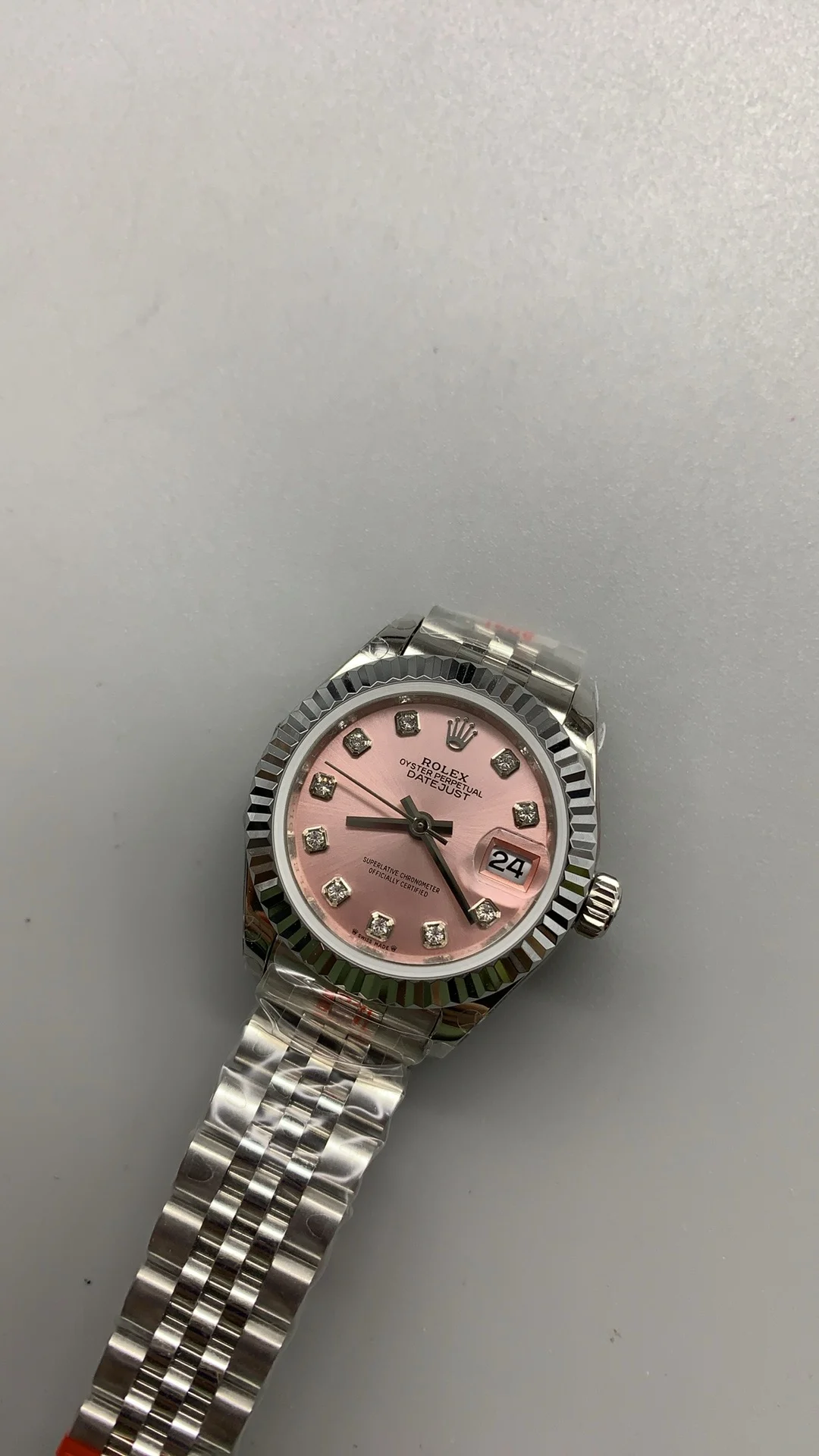 Rolex Datejust Pink Dial 28mm — photographed off the sweep