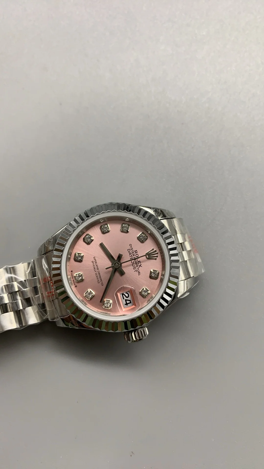Rolex Datejust Pink Dial 28mm — photographed off the sweep