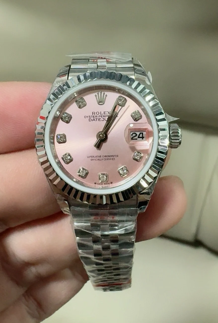 Rolex Datejust Pink Dial 28mm — photographed off the sweep