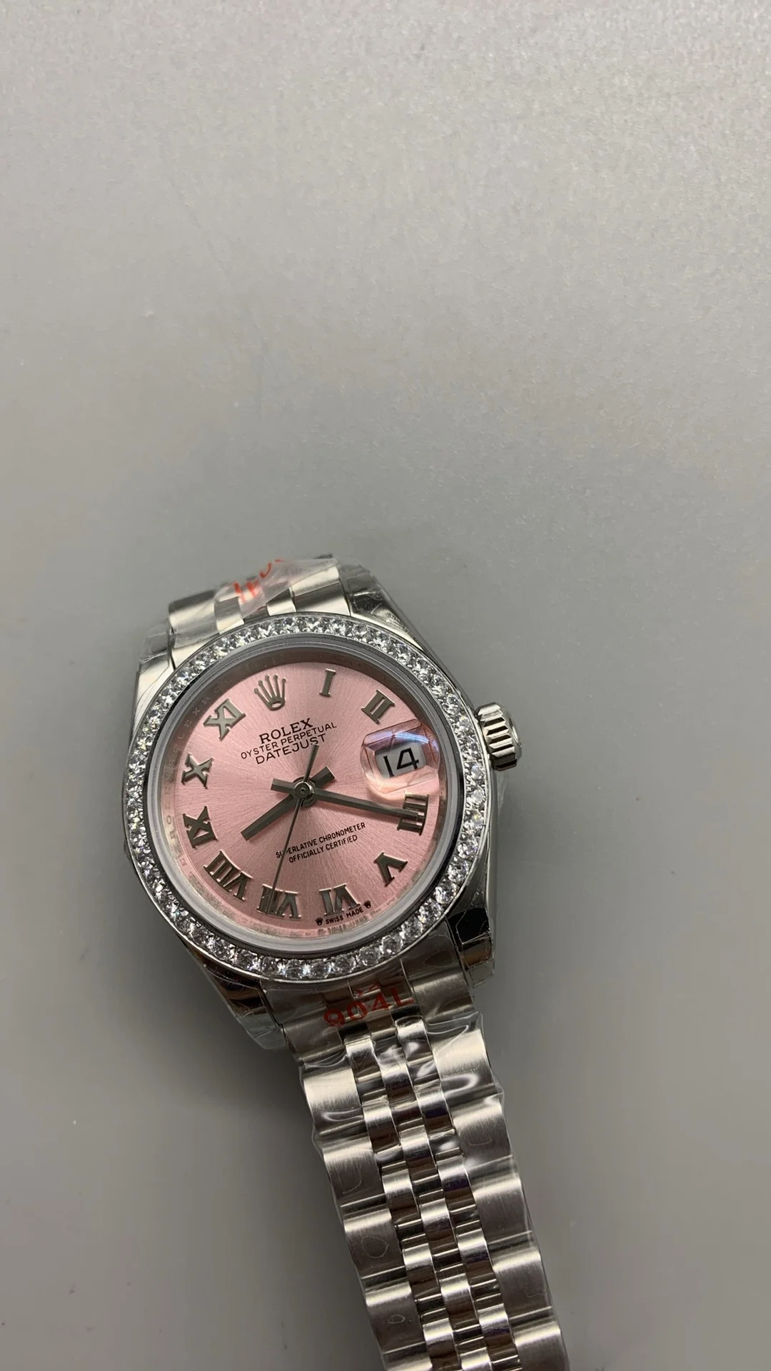 Rolex Datejust Pink Dial Diamond-Set 28mm — photographed off the sweep