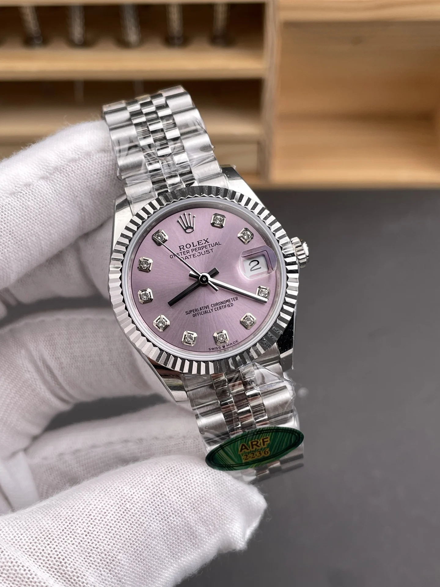 Rolex Datejust Pink Dial Diamond-Set 31mm — photographed off the sweep