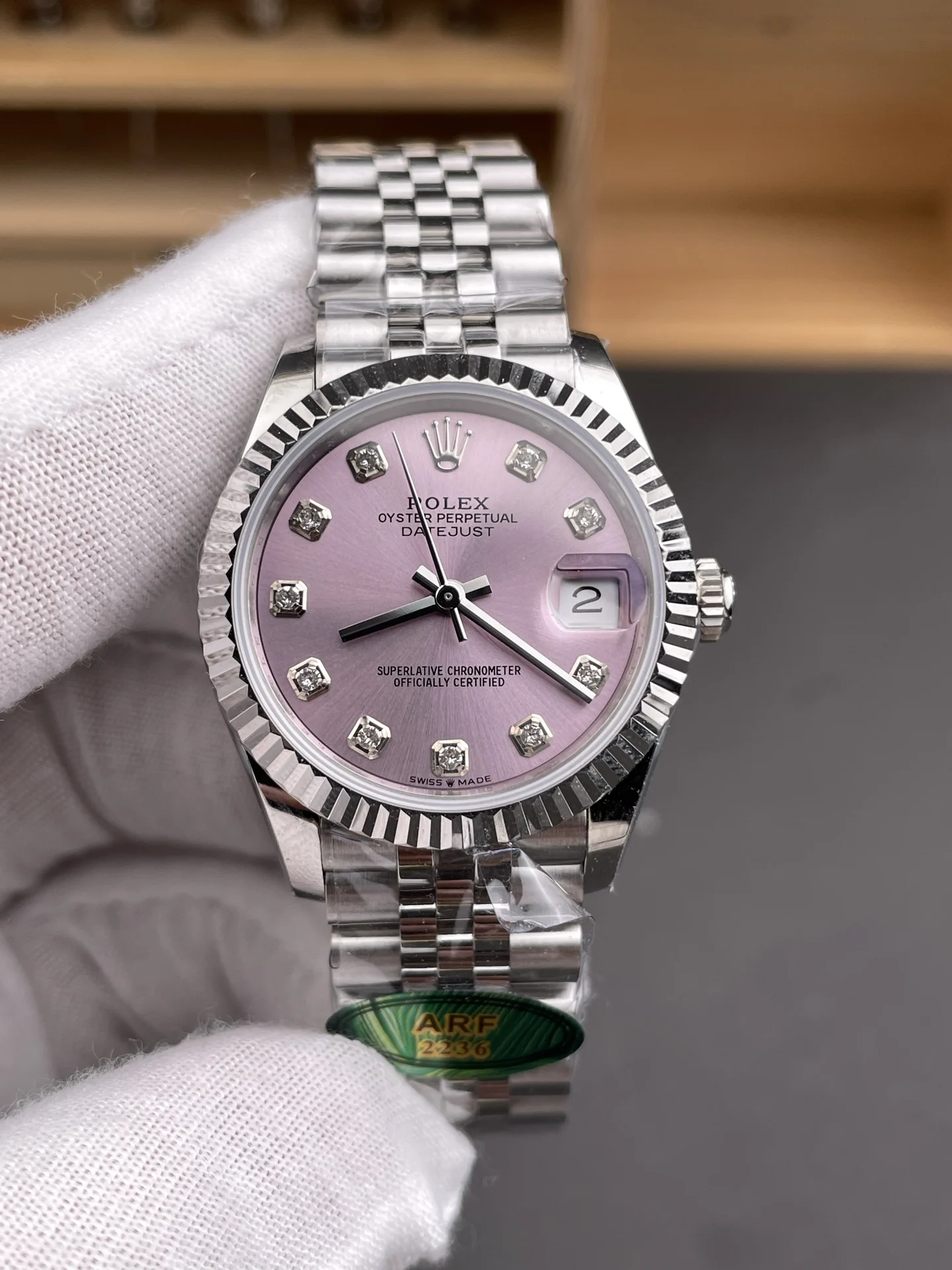Rolex Datejust Pink Dial Diamond-Set 31mm — photographed off the sweep