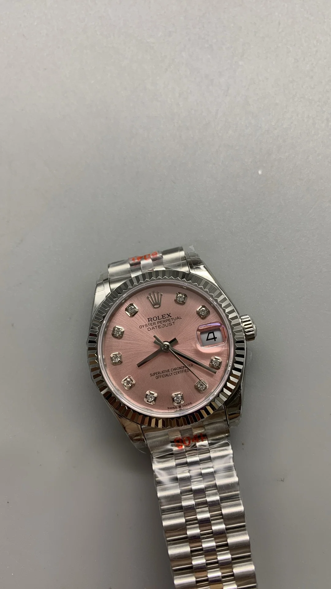Rolex Datejust Pink Dial Diamond-Set 31mm — photographed off the sweep