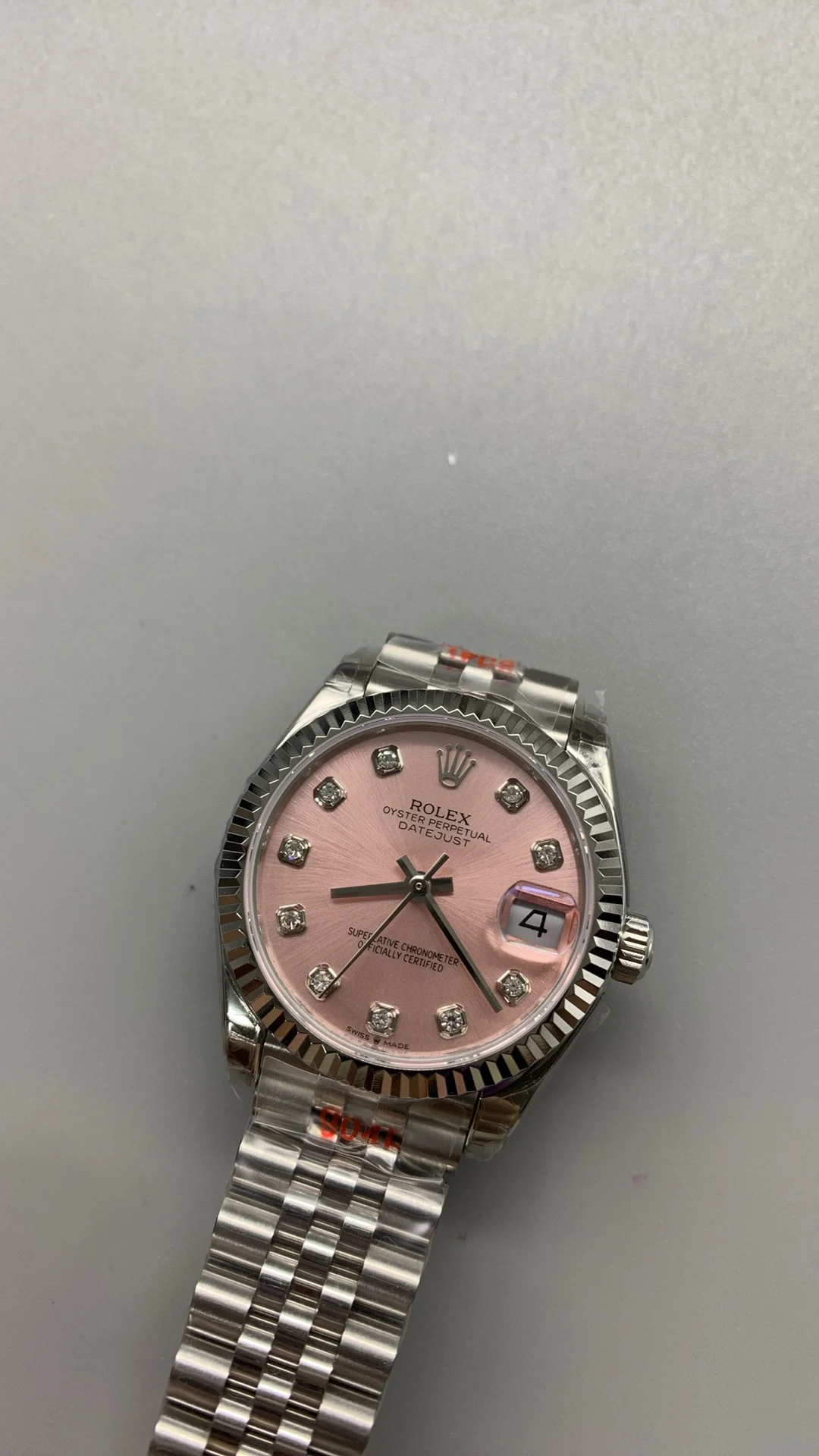 Rolex Datejust Pink Dial Diamond-Set 31mm — photographed off the sweep