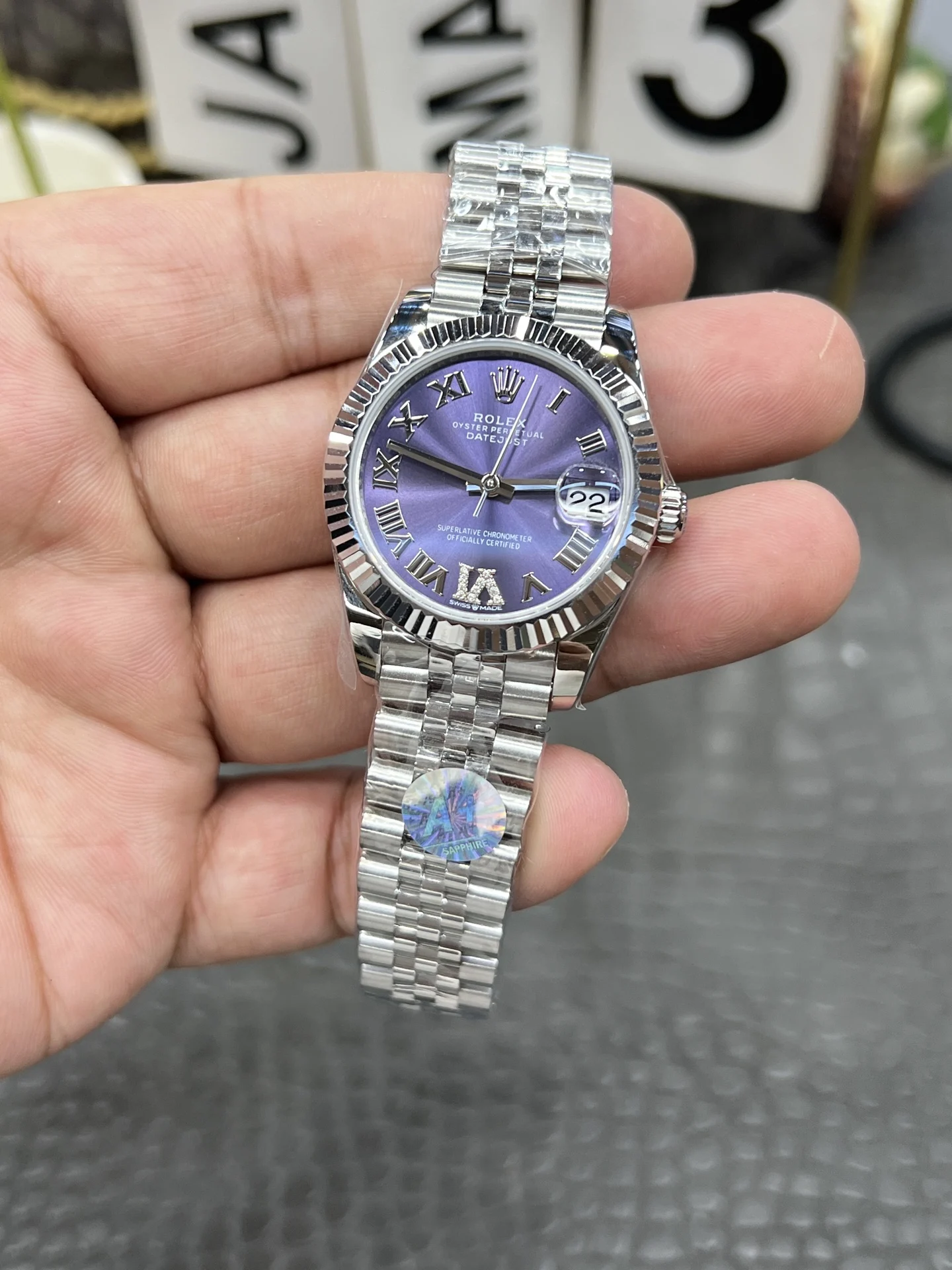 Rolex Datejust Purple Dial 31mm — photographed off the sweep