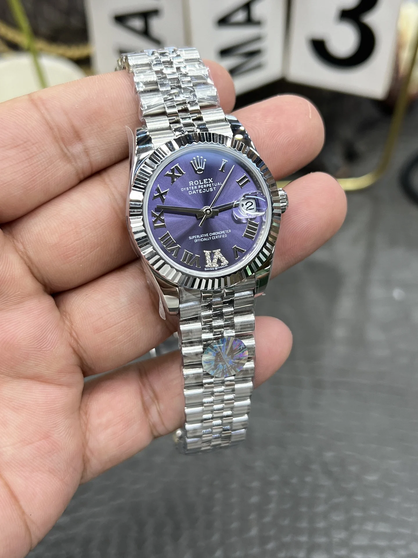 Rolex Datejust Purple Dial 31mm — photographed off the sweep