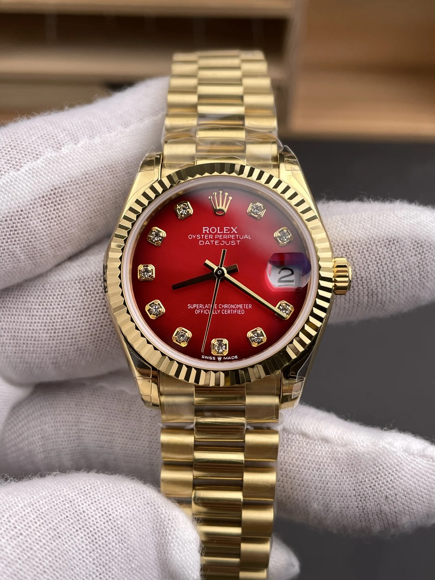 Rolex Datejust Red Dial — photographed off the sweep