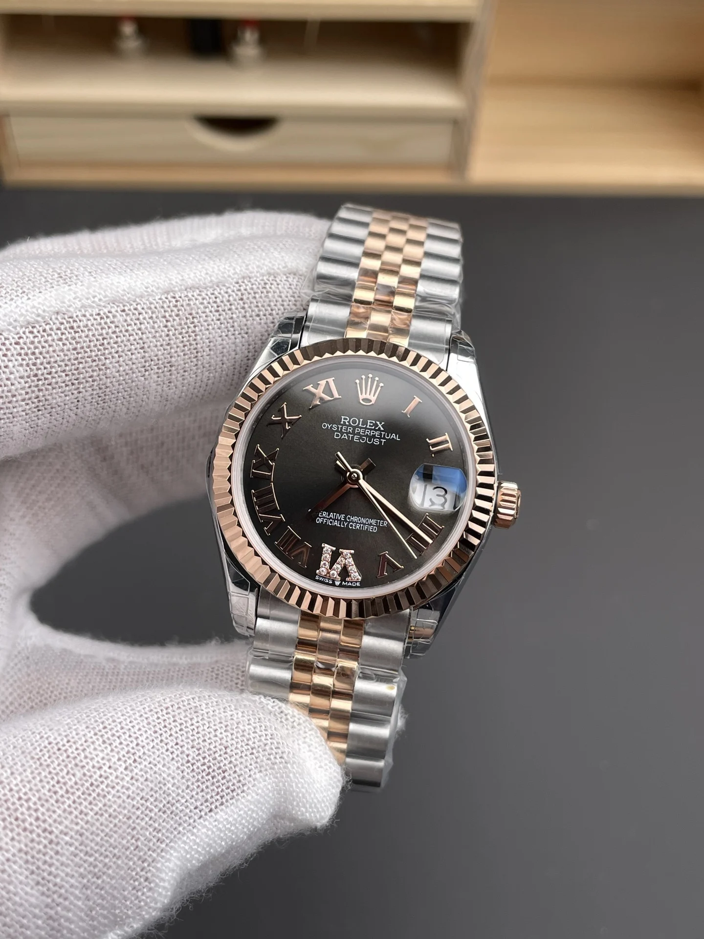 Rolex Datejust Rose Gold Brown Dial — photographed off the sweep