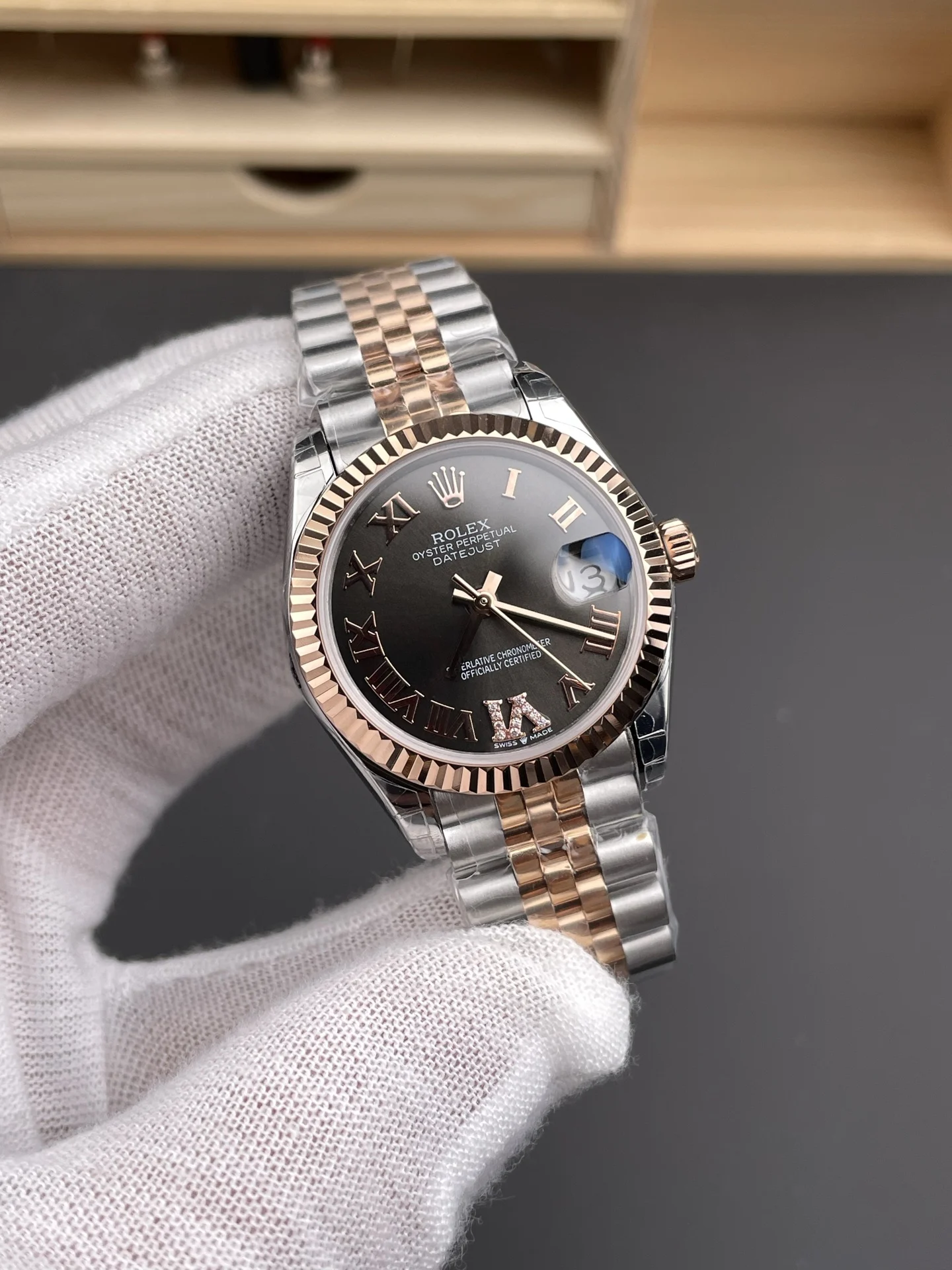 Rolex Datejust Rose Gold Brown Dial — photographed off the sweep