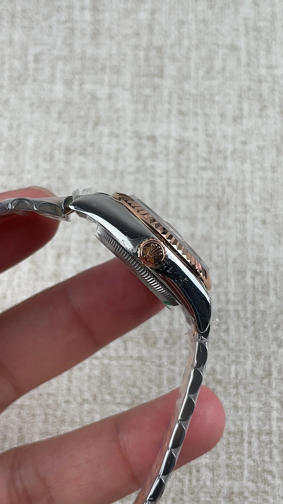Rolex Datejust Rose Gold Green Dial 28mm — photographed off the sweep