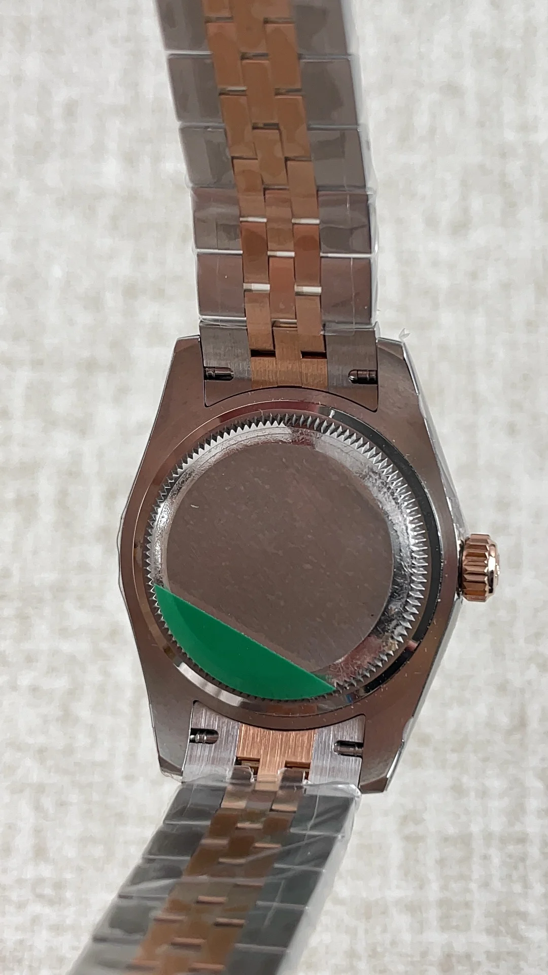 Rolex Datejust Rose Gold Green Dial 28mm — photographed off the sweep