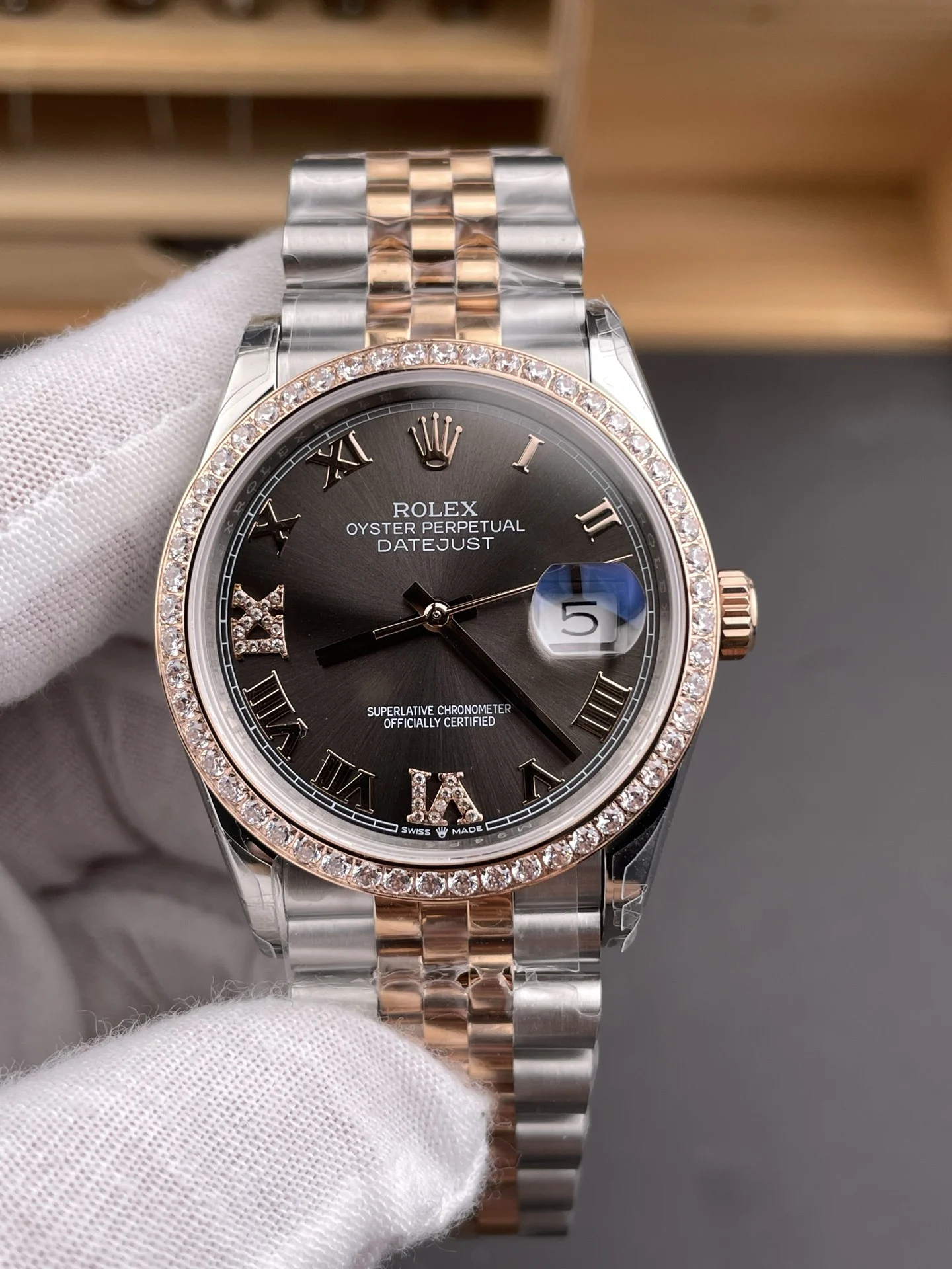Rolex Datejust Rose Gold Grey Dial — photographed off the sweep