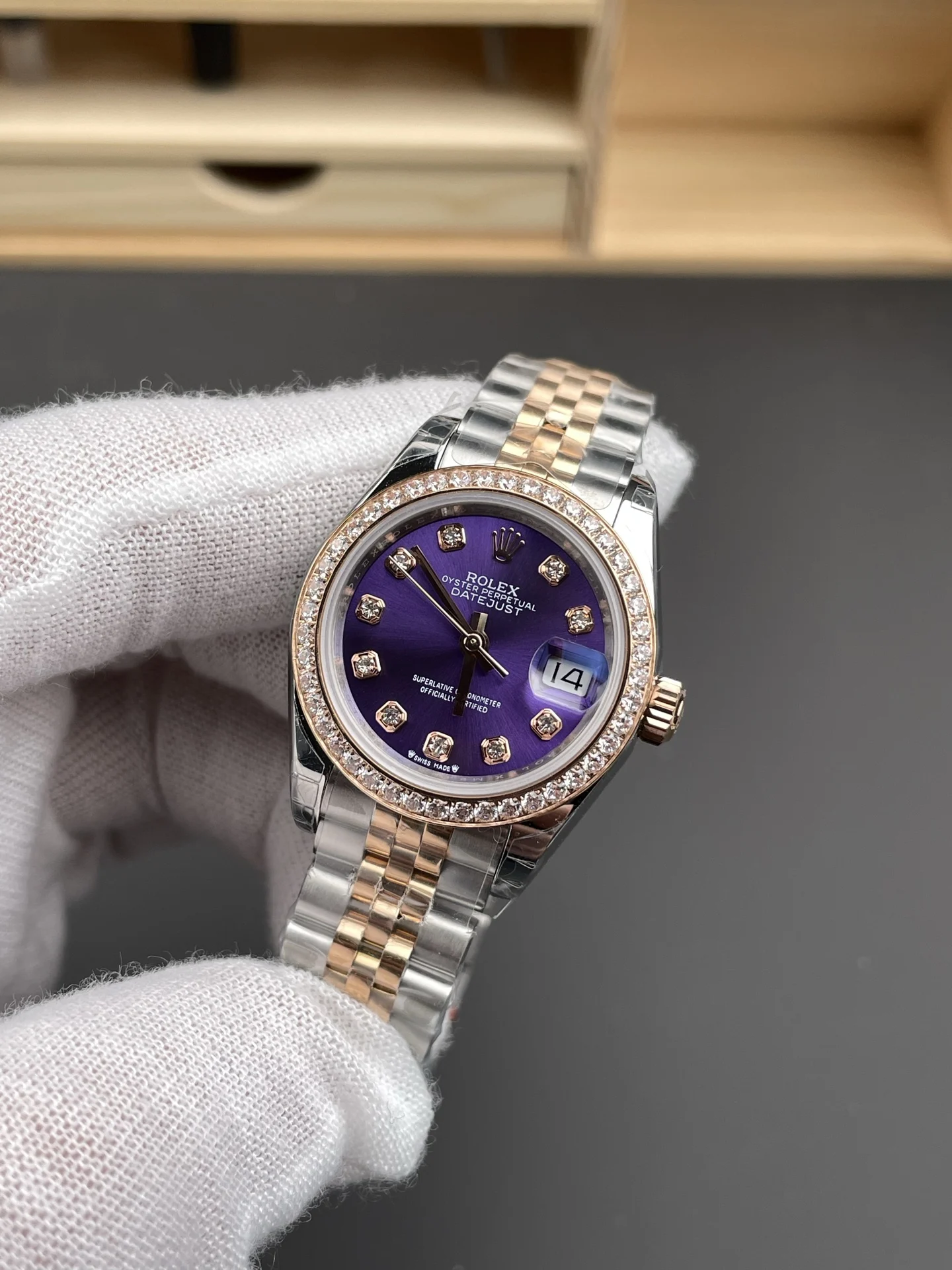 Rolex Datejust Rose Gold Purple Dial Diamond-Set 28mm — photographed off the sweep