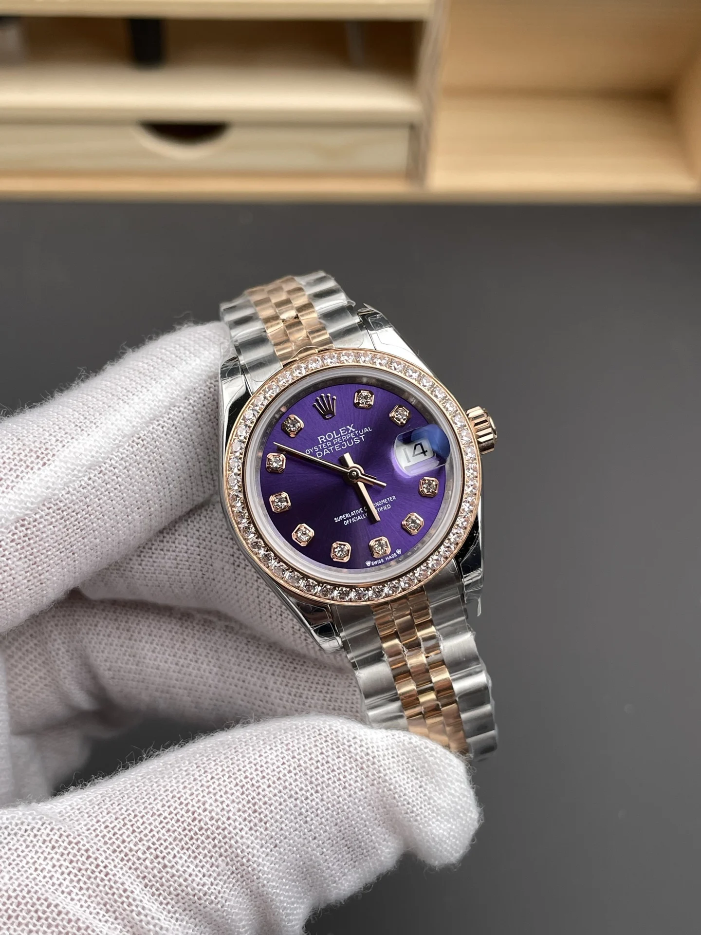 Rolex Datejust Rose Gold Purple Dial Diamond-Set 28mm — photographed off the sweep