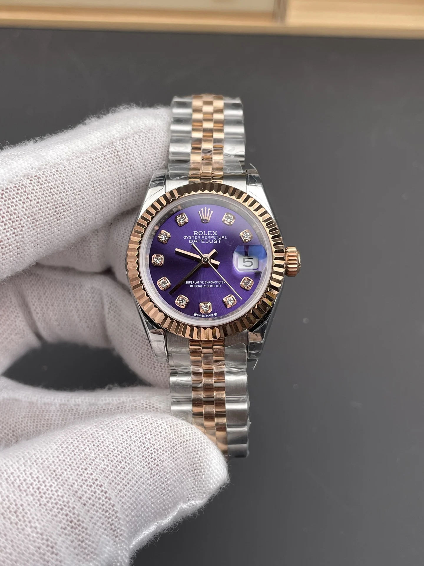 Rolex Datejust Rose Gold Purple Dial Diamond-Set 28mm — photographed off the sweep