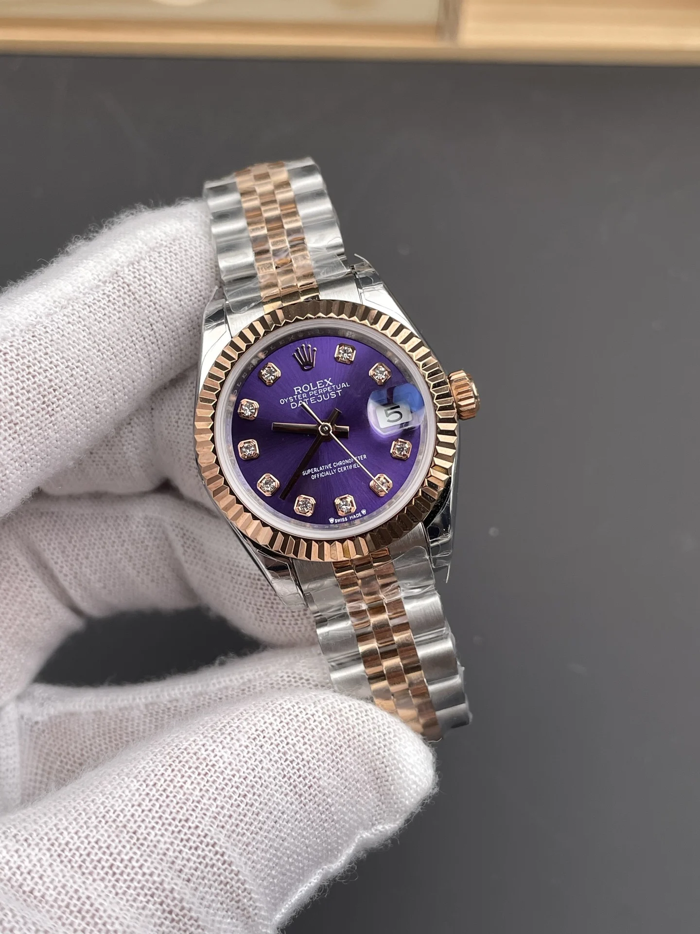 Rolex Datejust Rose Gold Purple Dial Diamond-Set 28mm — photographed off the sweep