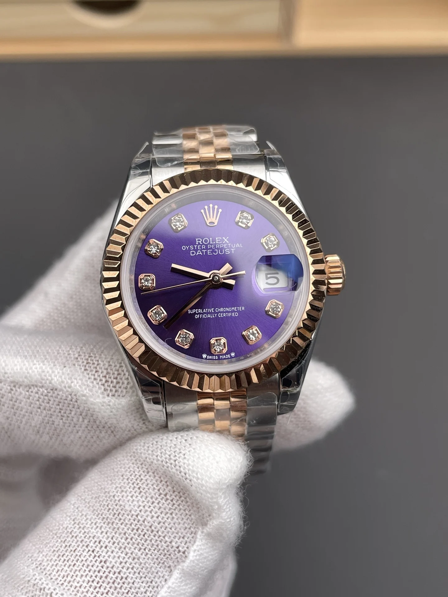Rolex Datejust Rose Gold Purple Dial Diamond-Set 28mm — photographed off the sweep