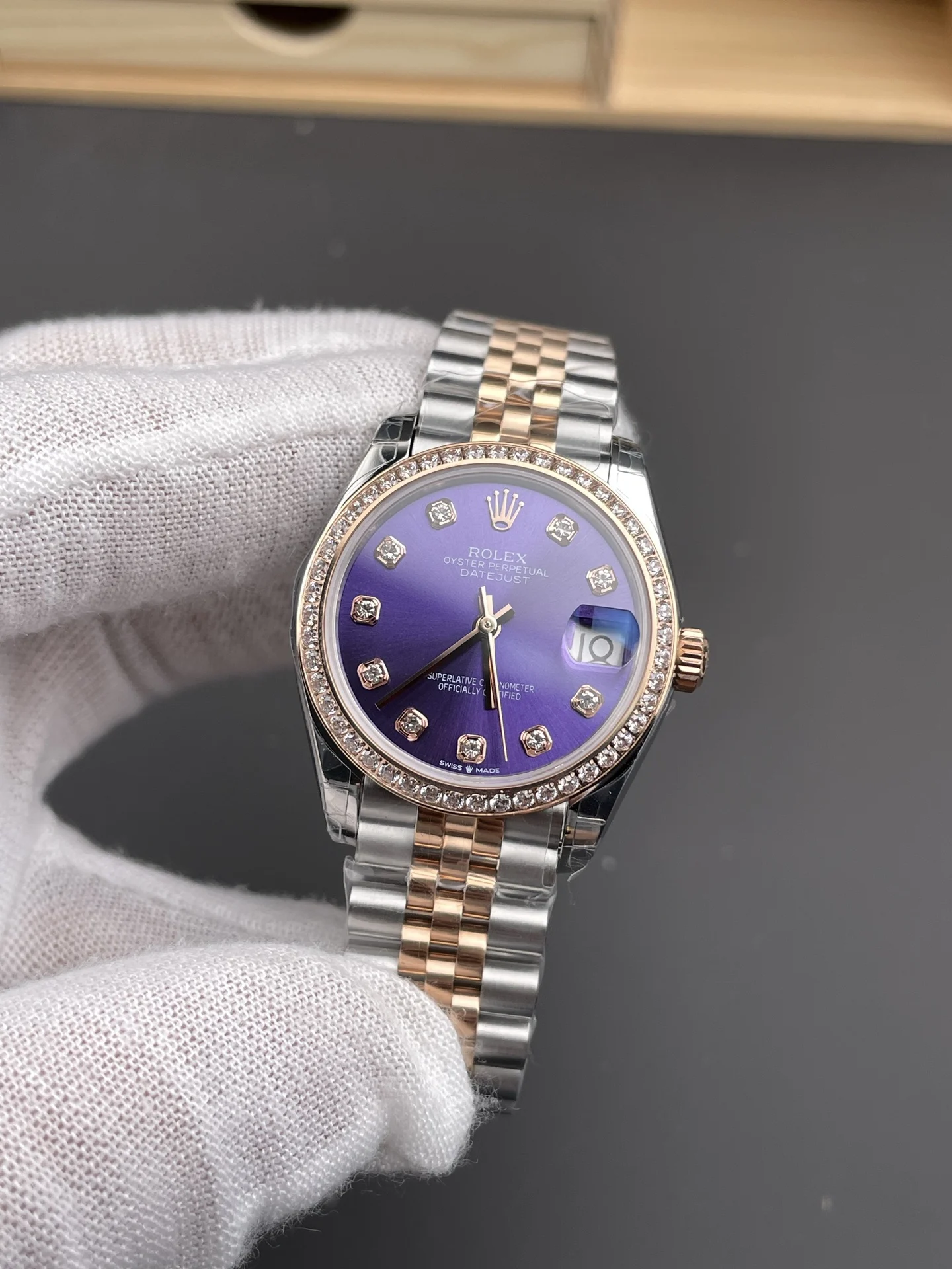 Rolex Datejust Rose Gold Purple Dial Diamond-Set 31mm — photographed off the sweep