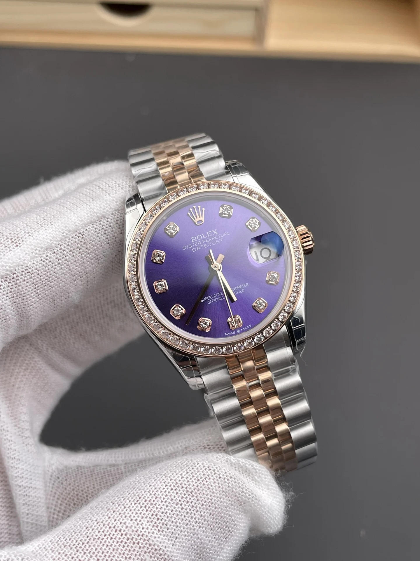 Rolex Datejust Rose Gold Purple Dial Diamond-Set 31mm — photographed off the sweep
