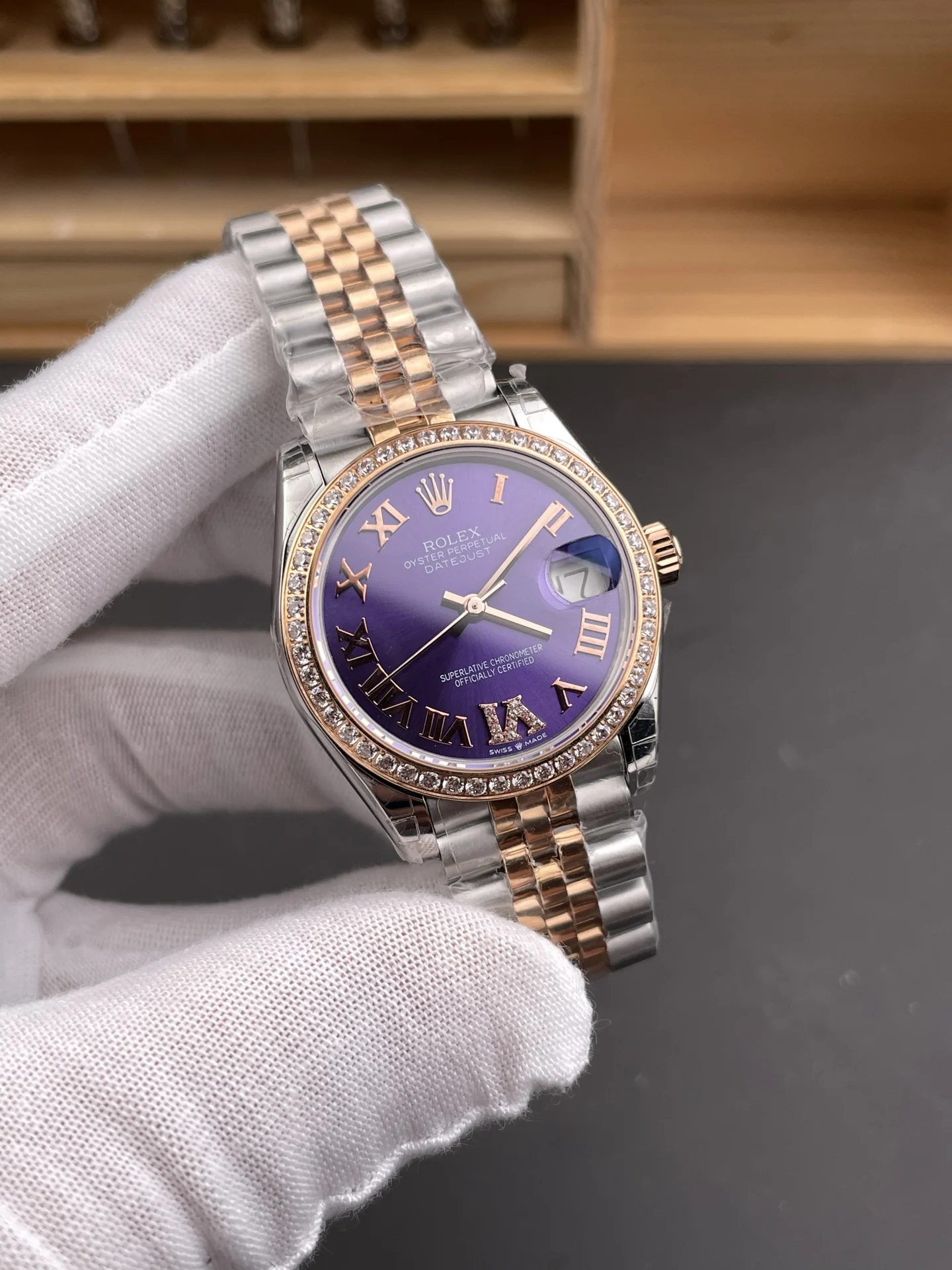 Rolex Datejust Rose Gold Purple Dial Diamond-Set 31mm — photographed off the sweep
