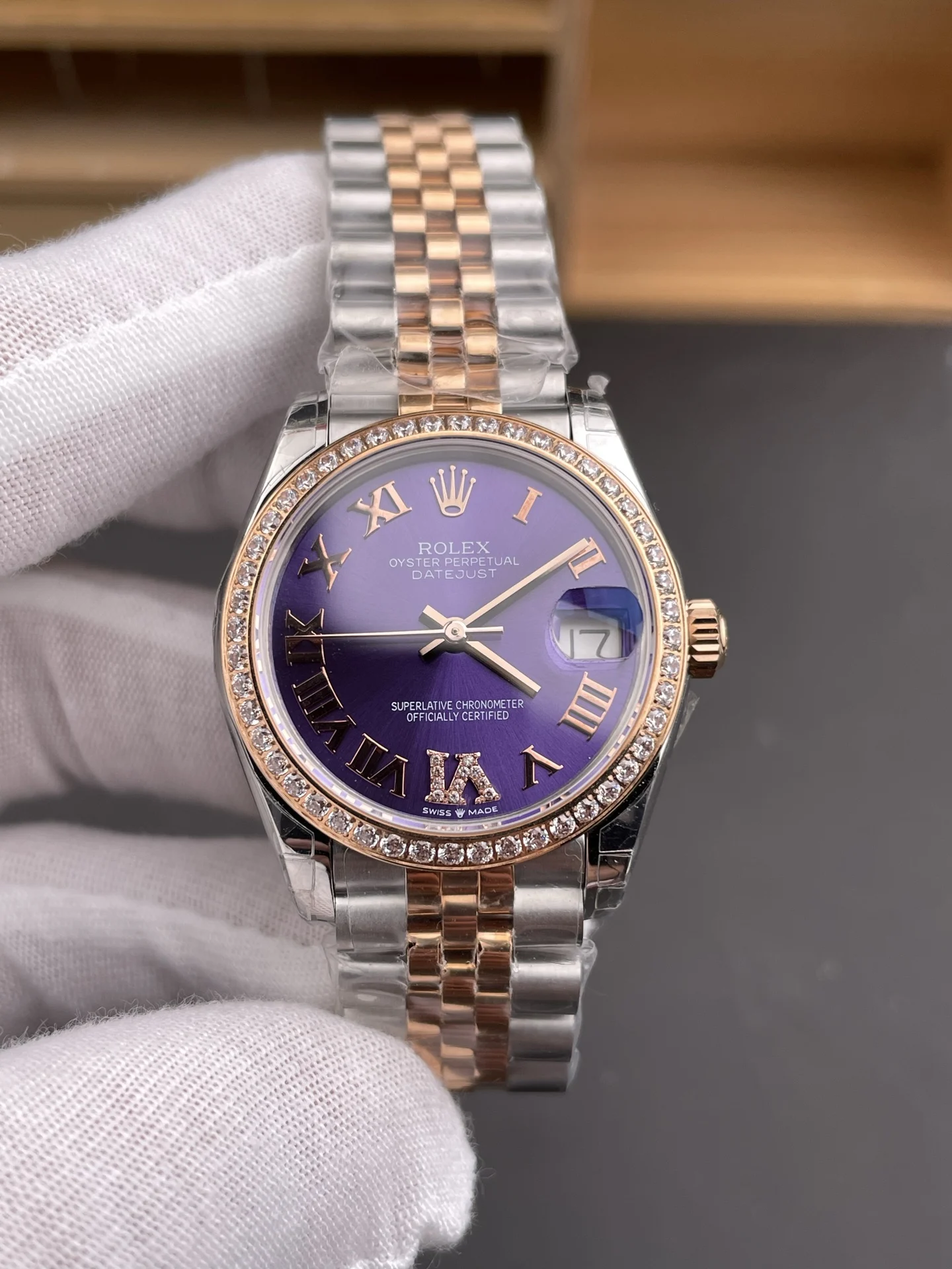 Rolex Datejust Rose Gold Purple Dial Diamond-Set 31mm — photographed off the sweep