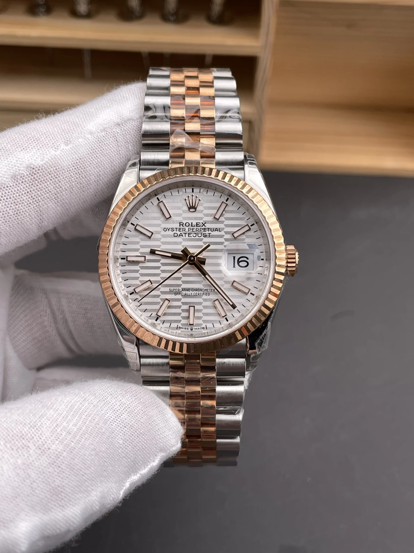 Rolex Datejust Rose Gold Silver Dial 36mm — photographed off the sweep