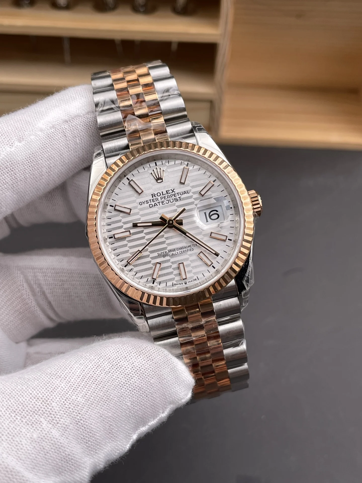 Rolex Datejust Rose Gold Silver Dial 36mm — photographed off the sweep