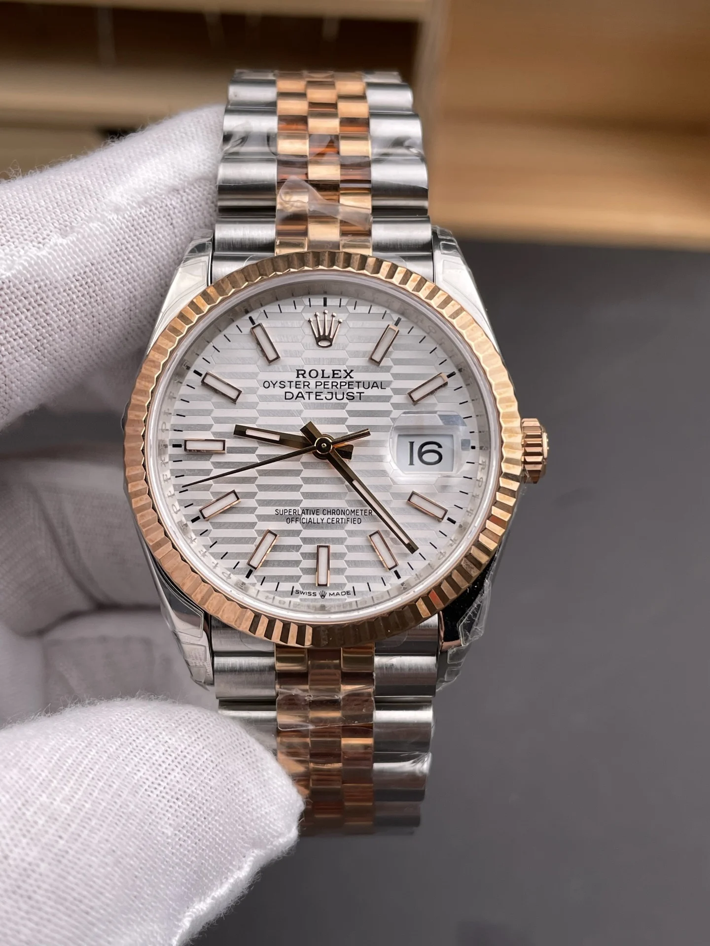 Rolex Datejust Rose Gold Silver Dial 36mm — photographed off the sweep