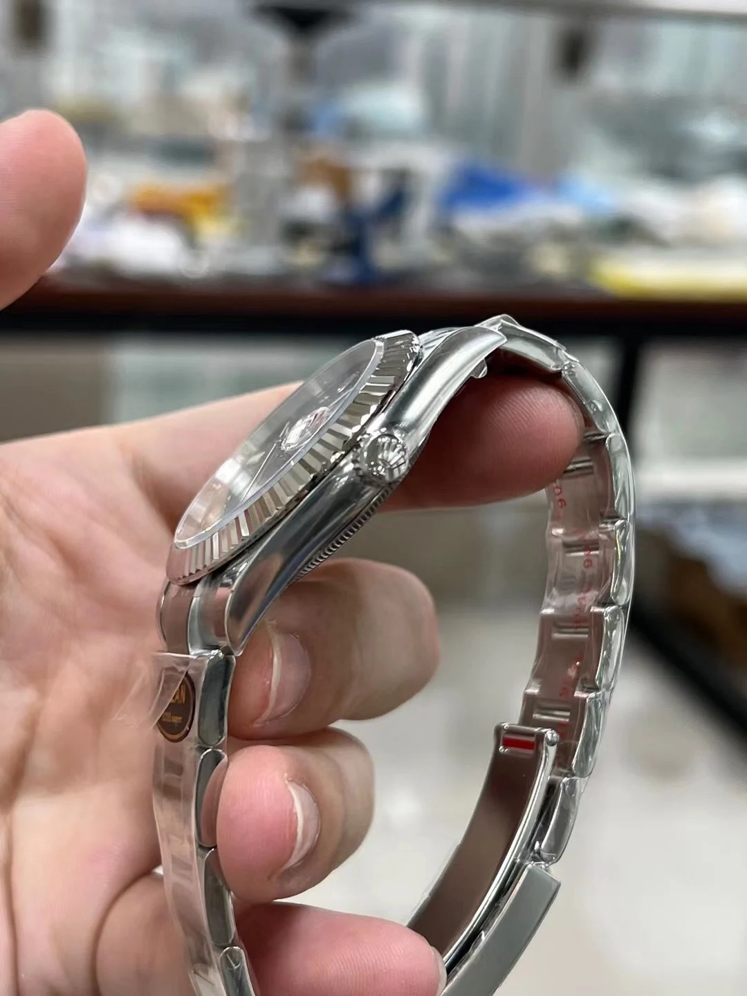 Rolex Datejust Steel Green Dial — photographed off the sweep