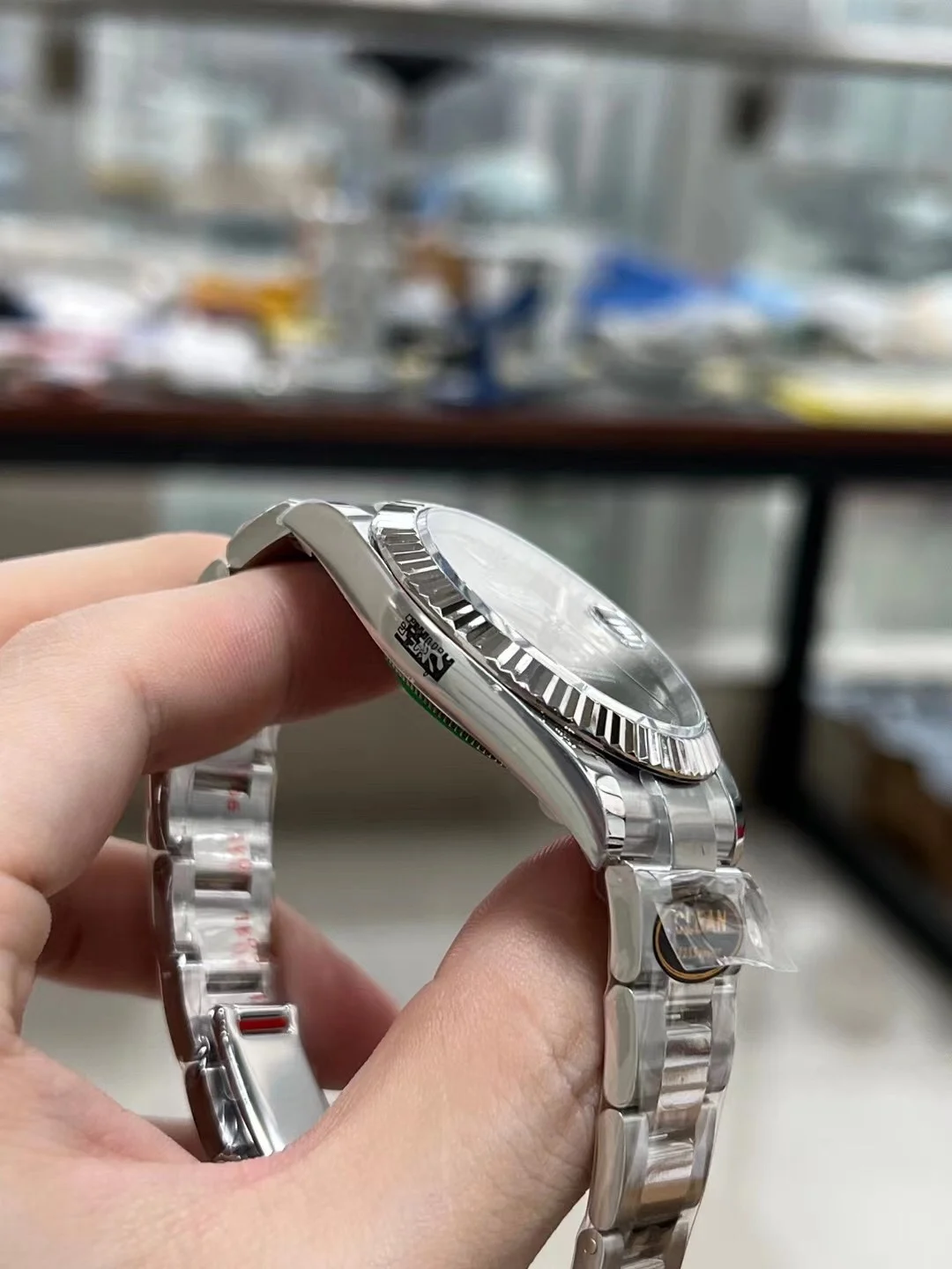 Rolex Datejust Steel Green Dial — photographed off the sweep