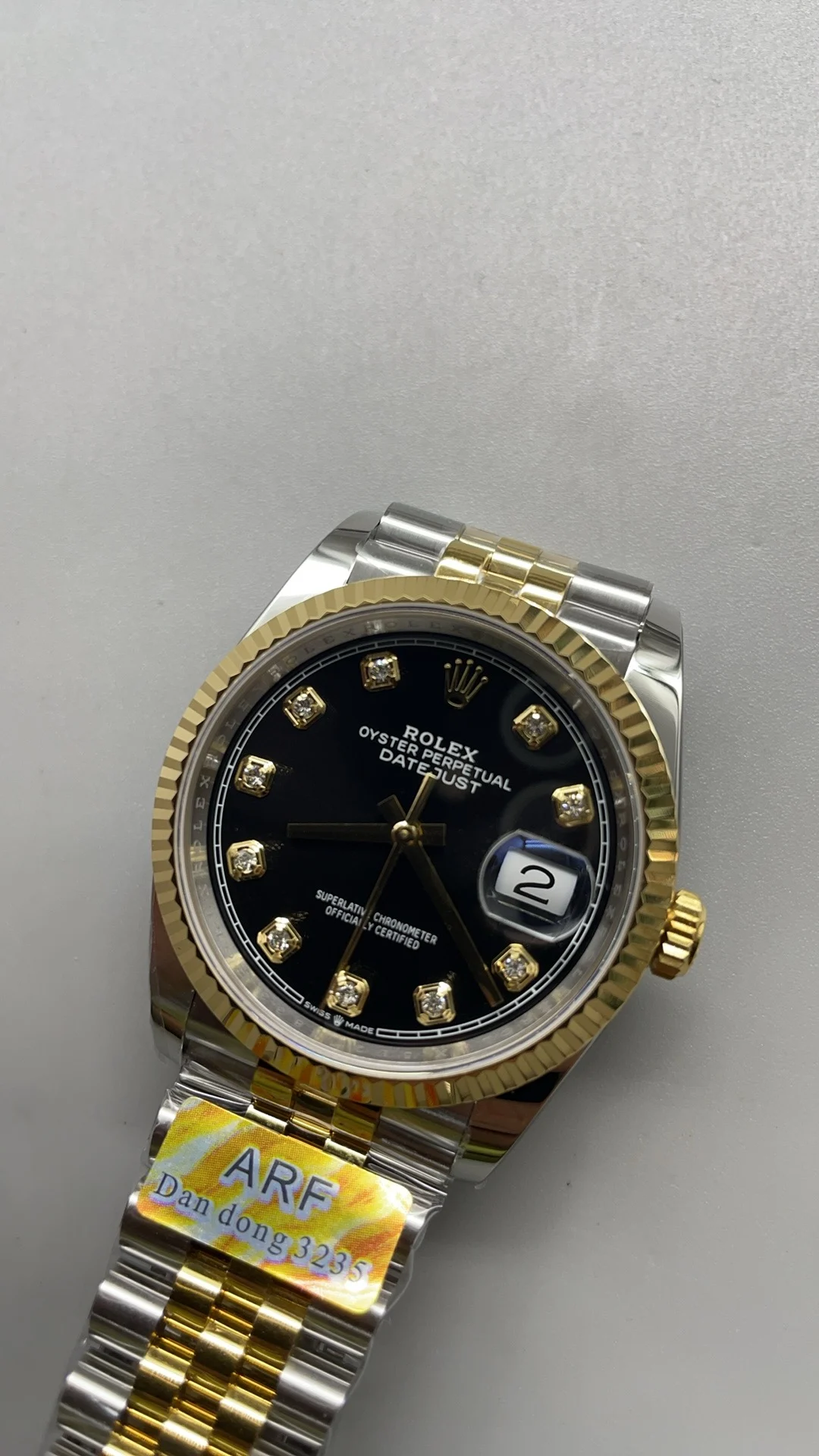 Rolex Datejust Two-Tone Black Dial Diamond-Set 36mm — photographed off the sweep