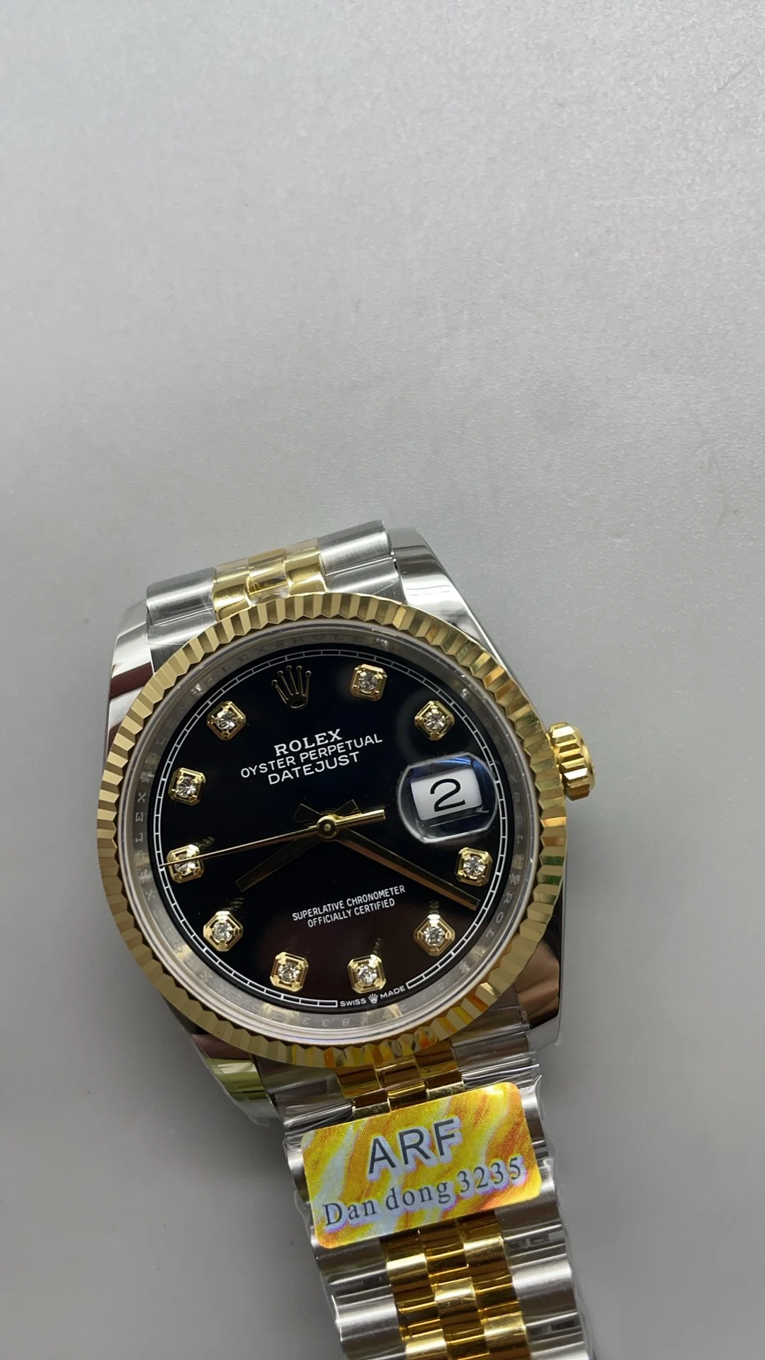 Rolex Datejust Two-Tone Black Dial Diamond-Set 36mm — photographed off the sweep