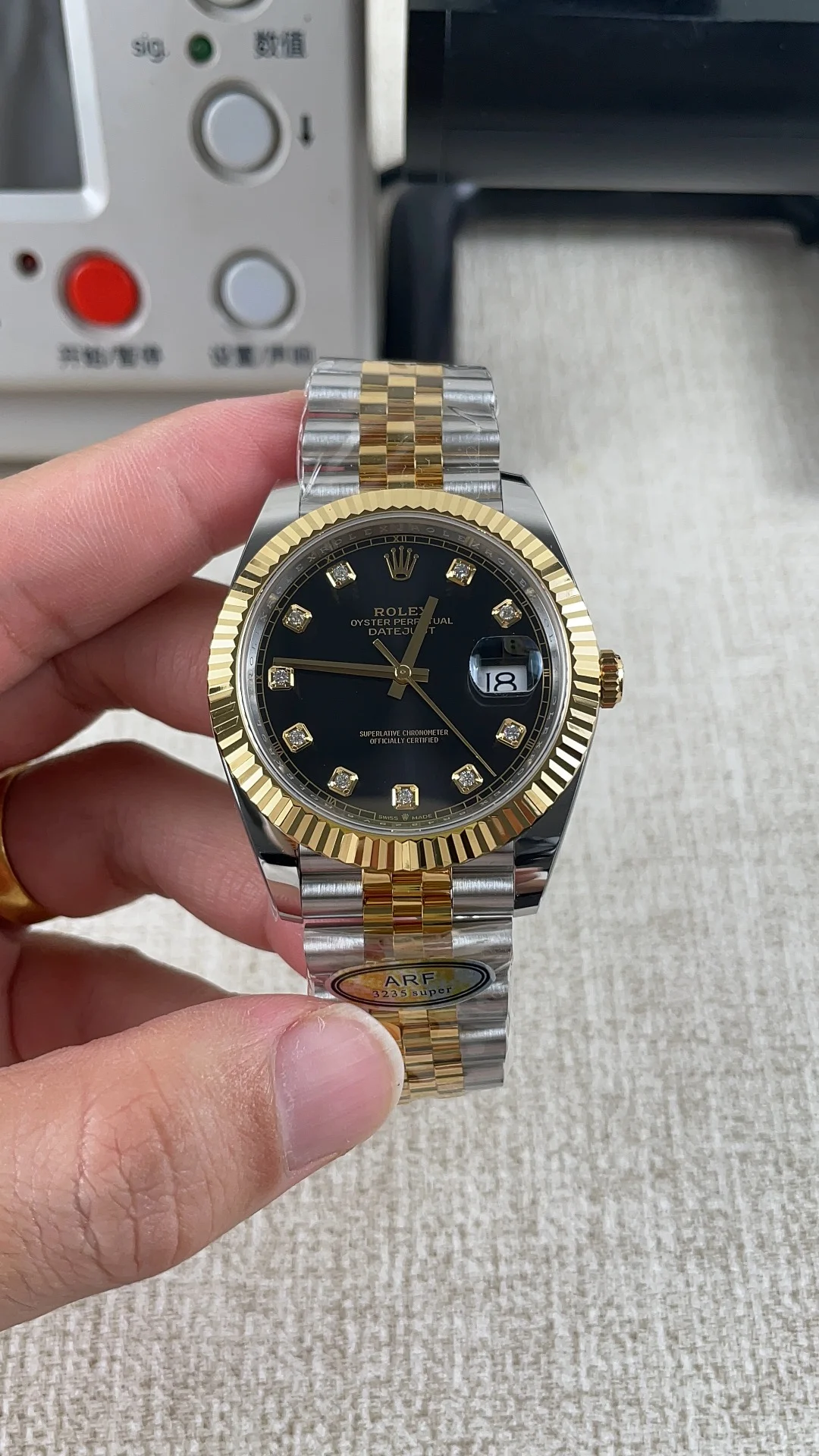 Rolex Datejust Two-Tone Black Dial Diamond-Set 41mm — photographed off the sweep