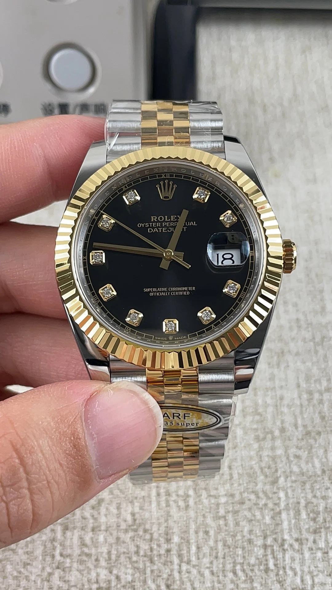Rolex Datejust Two-Tone Black Dial Diamond-Set 41mm — photographed off the sweep