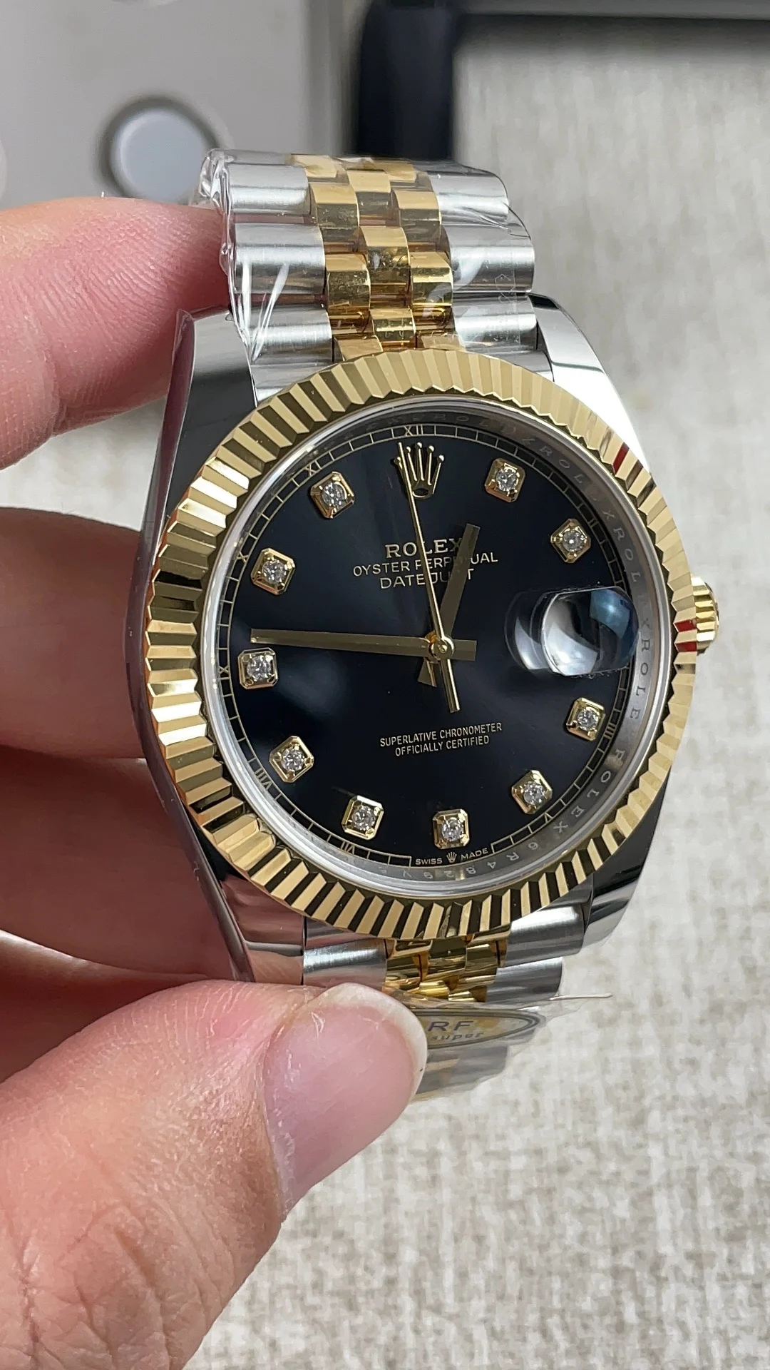 Rolex Datejust Two-Tone Black Dial Diamond-Set 41mm — photographed off the sweep