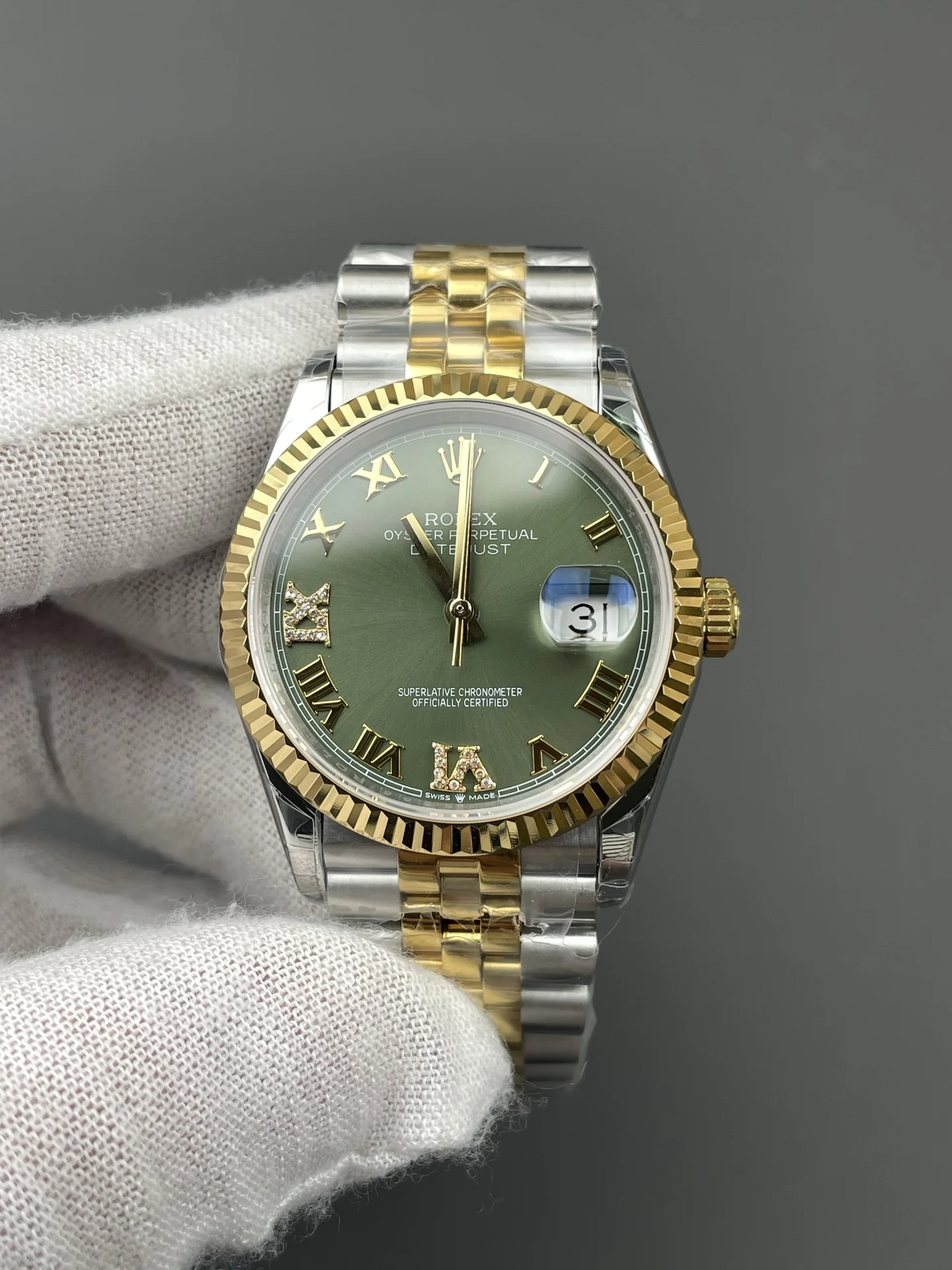 Rolex Datejust Two-Tone Green Dial 36mm — photographed off the sweep