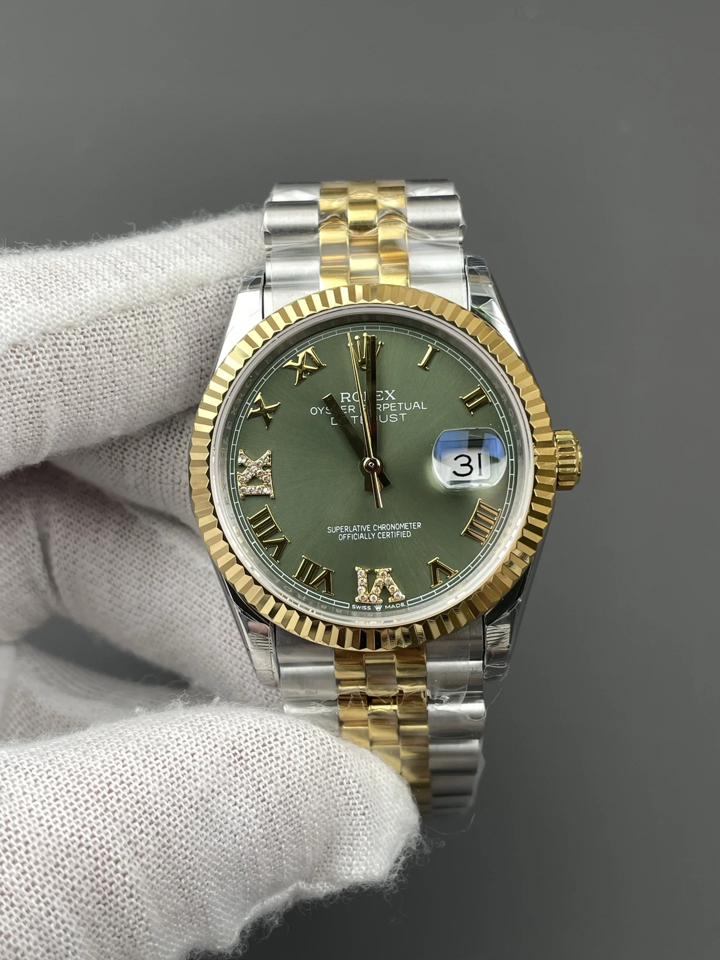 Rolex Datejust Two-Tone Green Dial 36mm — photographed off the sweep