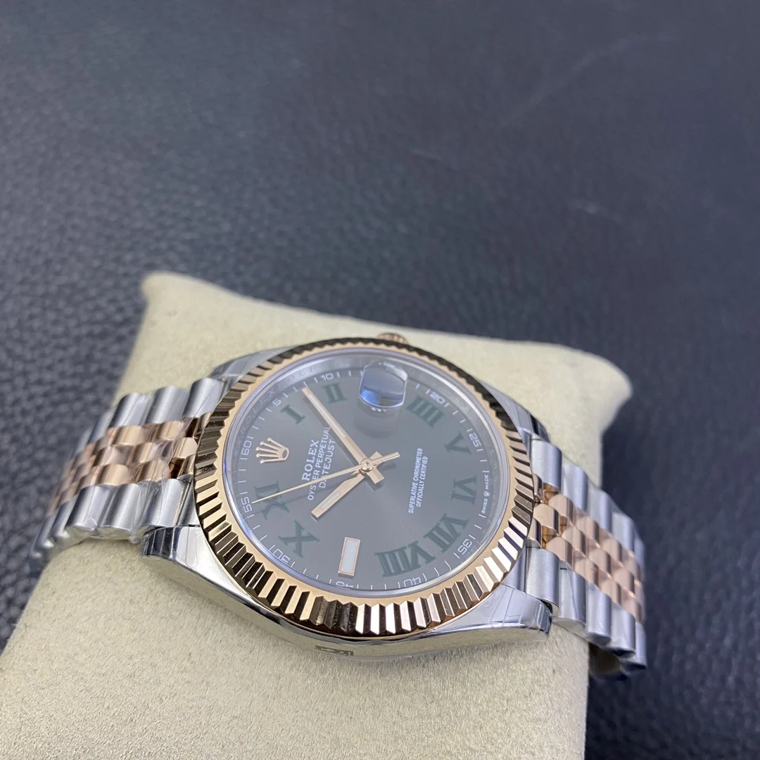 Rolex Datejust Two-Tone Green Dial 41mm — photographed off the sweep