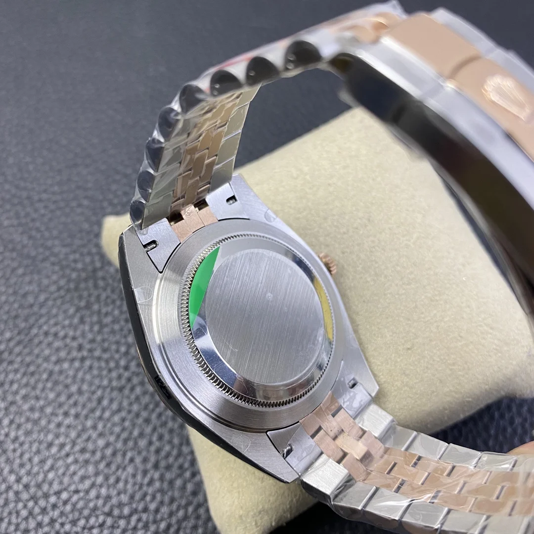 Rolex Datejust Two-Tone Green Dial 41mm — photographed off the sweep