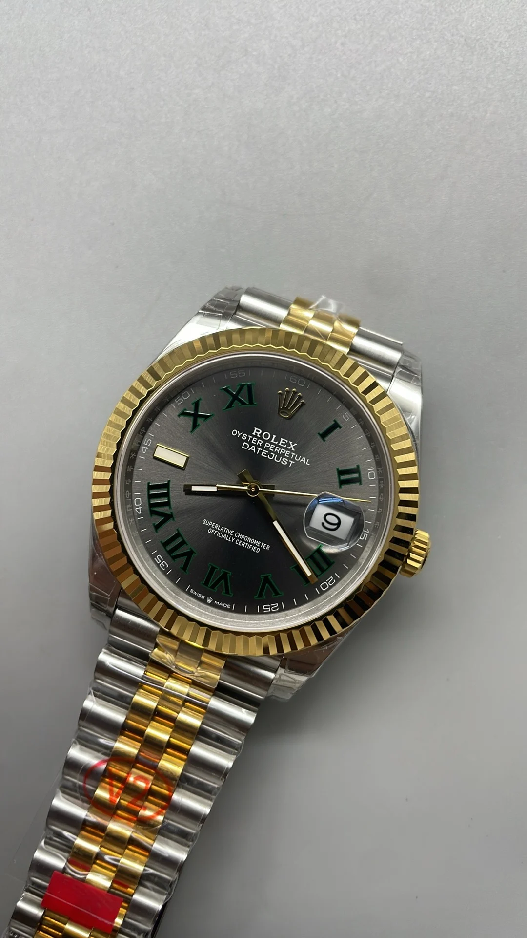 Rolex Datejust Two-Tone Green Dial 41mm — photographed off the sweep