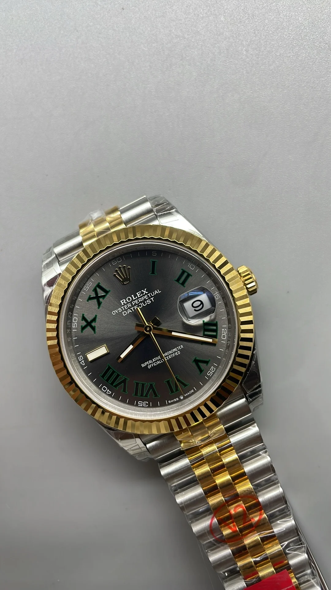 Rolex Datejust Two-Tone Green Dial 41mm — photographed off the sweep