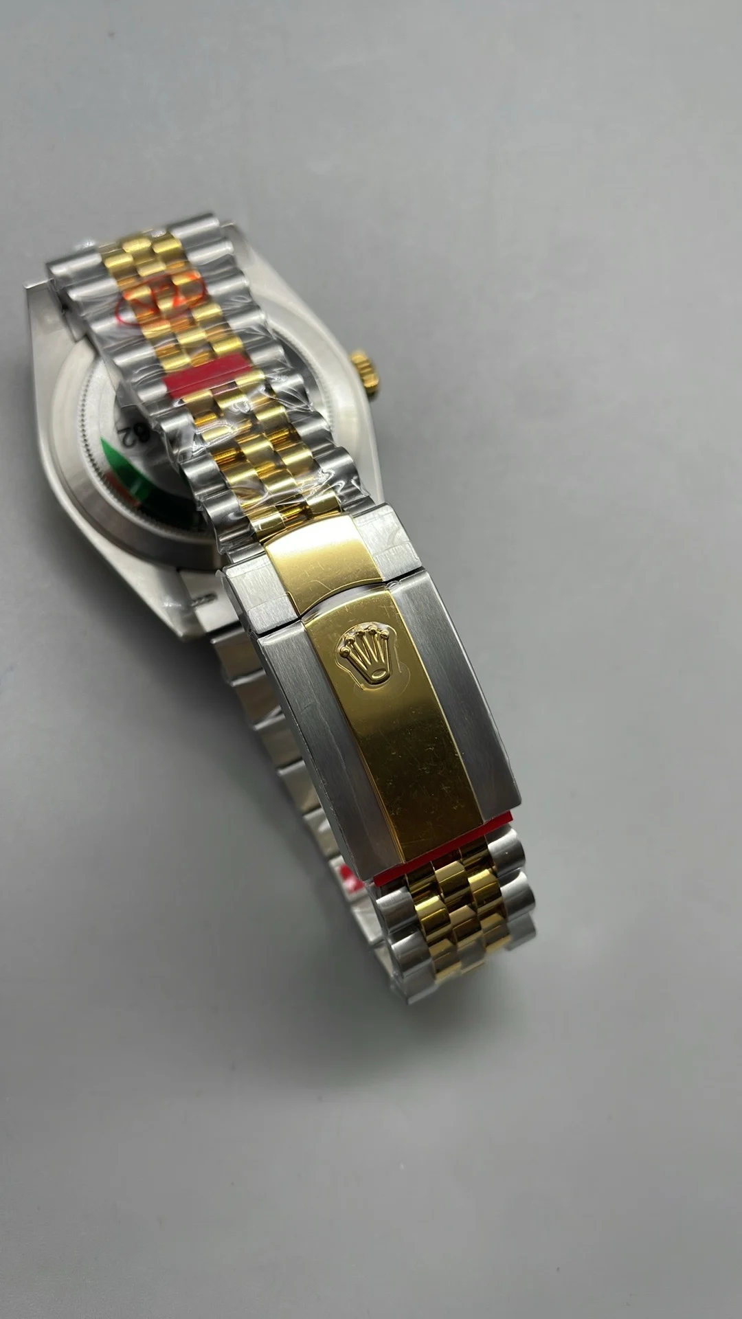 Rolex Datejust Two-Tone Green Dial 41mm — photographed off the sweep