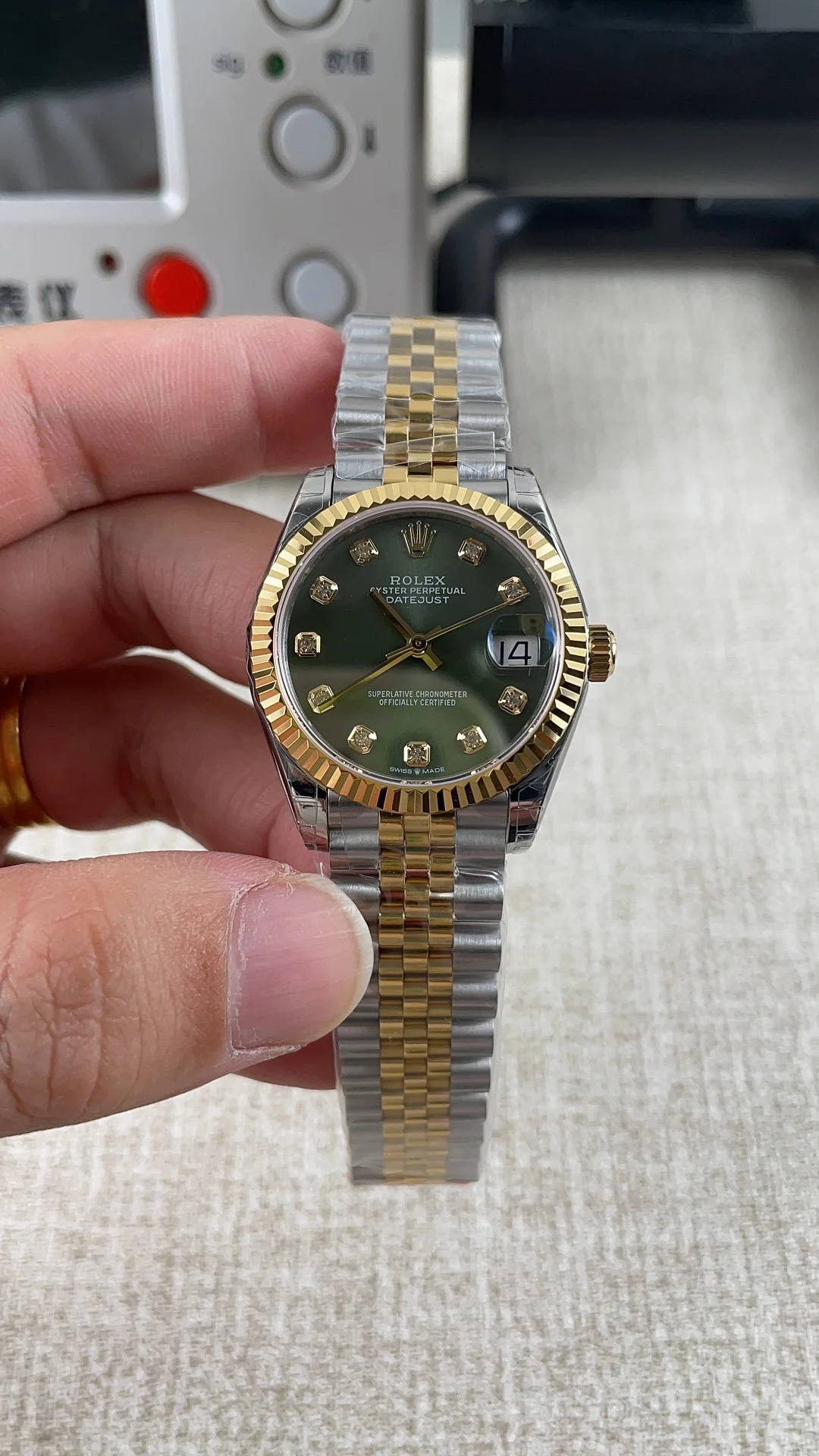 Rolex Datejust Two-Tone Green Dial Diamond-Set 31mm — photographed off the sweep